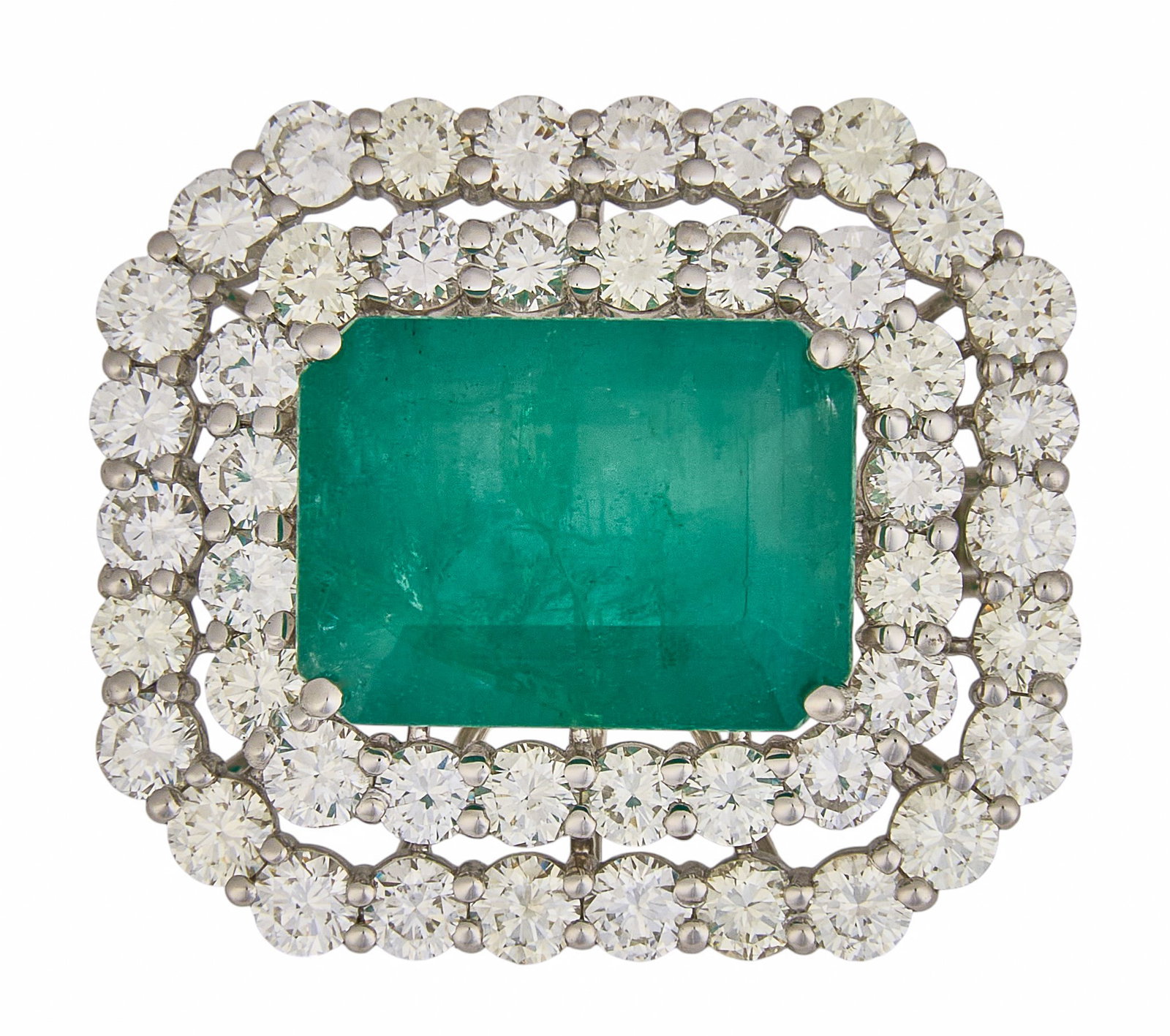 Platinum Emerald & Diamond Double Halo Ring: Platinum ring centering an emerald-cut emerald weighing approximately 6.04 ct, framed by a double halo of round brilliant-cut diamonds totaling approximately 2.68 ctw, graded approximately