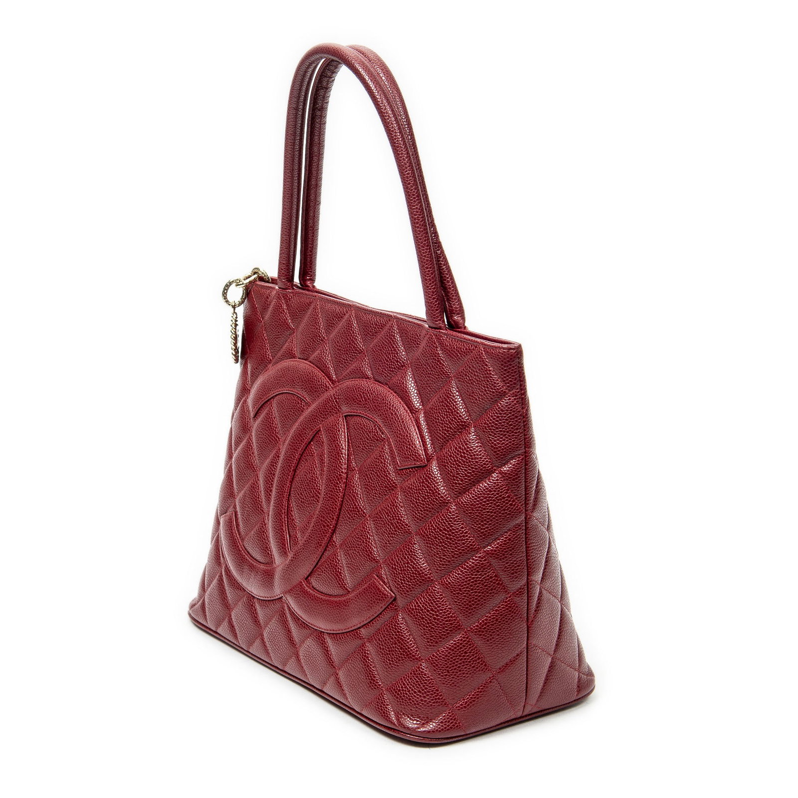 Chanel Timeless Medallion Tote Shoulder Bag: Chanel Timeless Medallion Tote shoulder bag in red quilted caviar leather, gold hardware, marked 7256397 (2002-2003); third-party authenticated 11.75 in. x 9.75 in. x 5.5 in. Condition A; excellent