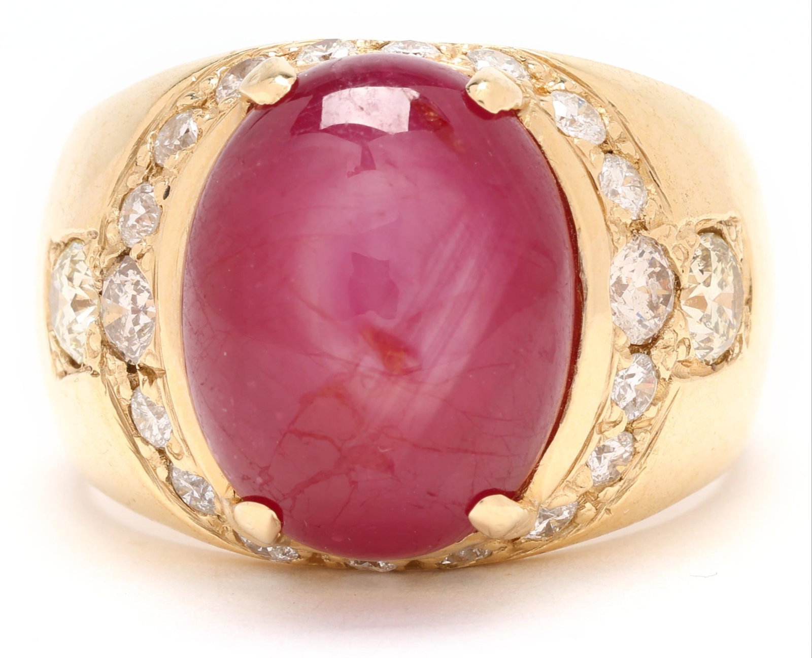 Men's 14K Star Ruby Diamond Ring: Men's 14K gold ring centering an oval composite star ruby cabochon, approximately 15.4 ct, accented by halo of round brilliant-cut diamonds, approximately 0.94 ctw, (I-J color, I1-I2 clarity),