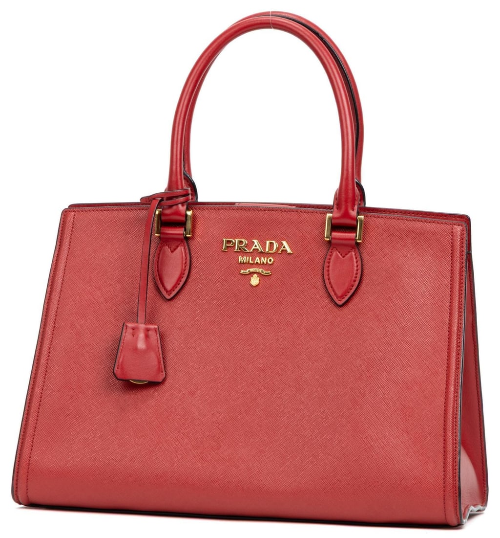 Prada Shopper Tote Medium Handbag: Prada Shopper Tote medium handbag of red Saffiano calfskin with red leather handles, and gold-toned hardware, marked 203; third-party authenticated 13.5 in. x 8.75 in. x 6 in . Condition AA; perfect