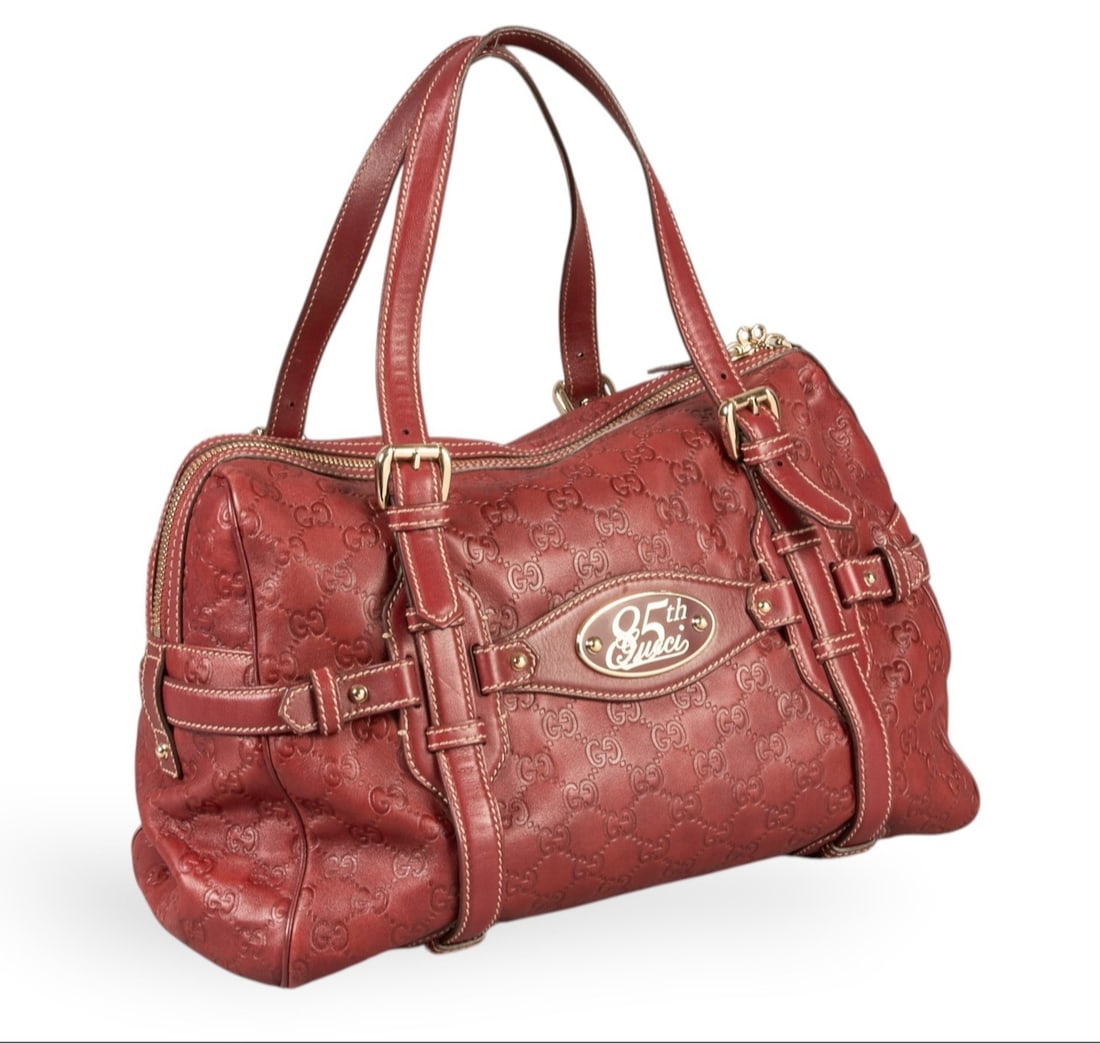Gucci 85th Anniversary Horsebit Boston Shoulder Bag: Gucci 85th Anniversary Horsebit Boston shoulder bag in dark red guccissima leather with dark red leather handles, and gold hardware, marked 163290 001998, includes cadenas, and keys in clochette;