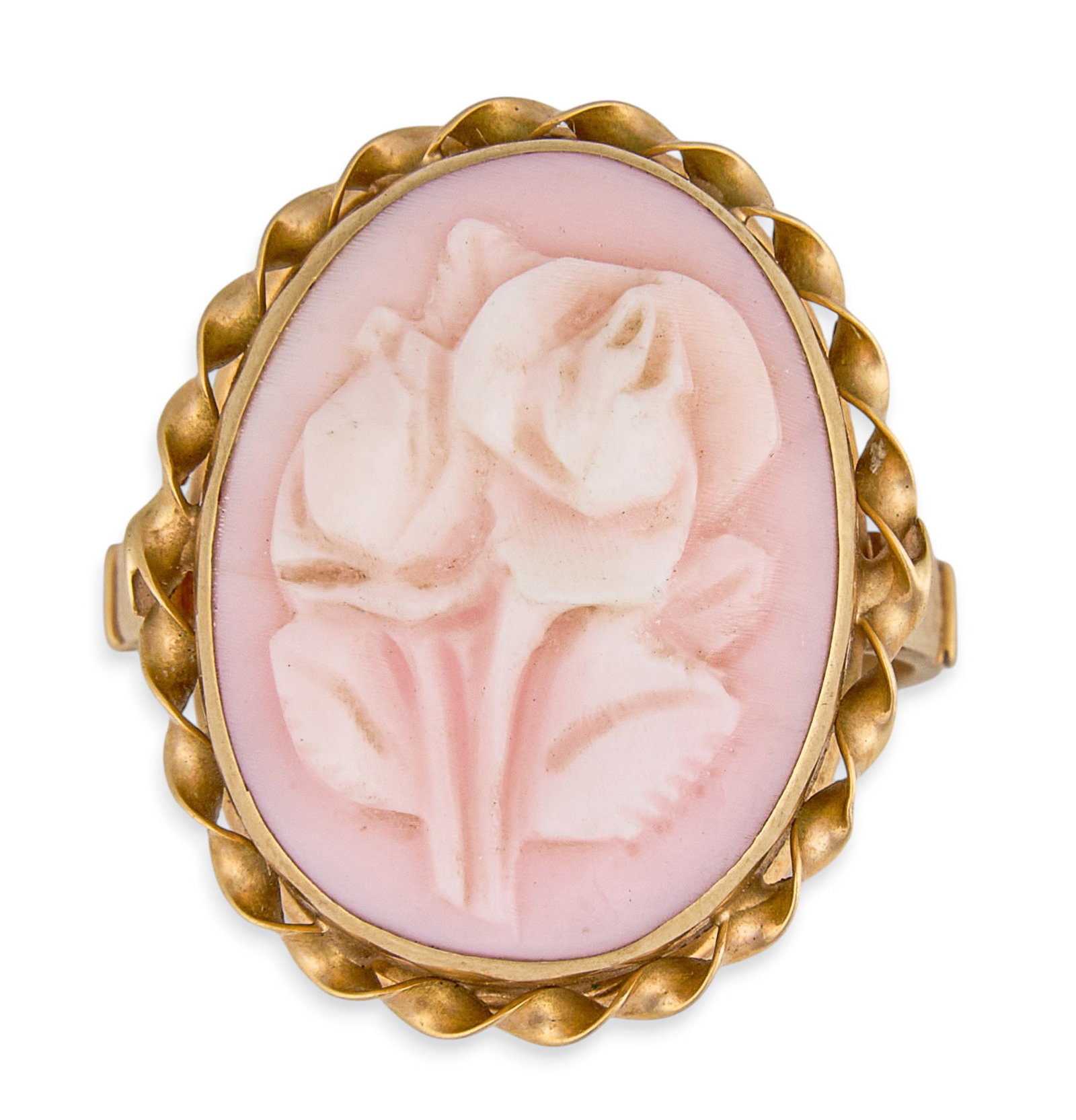 14K Carved Shell Flower Cameo Ring: 14K yellow gold ring set with carved shell cameo depicting floral motif, in twisted setting, marked "14K" Size: 5.5 Total weight: 7.5 in. Provenance: Property from a home in San Antonio, Tex