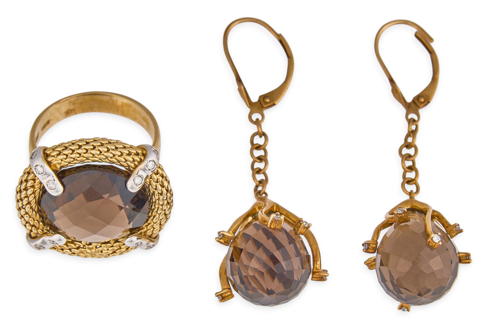 14K Smoky Quartz & Diamond Suite: 14K yellow gold ring and earrings set, both set with large smoky quarts stones, accented by round diamond details, marked "14K Italy" Size: 7 Total weight: 19.7 g Provenance: Property