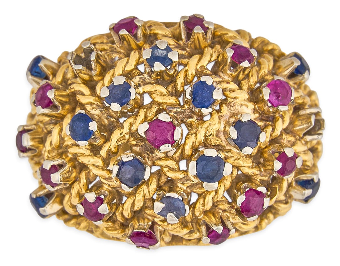 14K Gemstone Dome Ring: 14K gold dome ring with twisted wire deign, set with round faceted sapphire and ruby gemstones, marked "14K" and "ITALY" Size: Total weight: 7.68 g