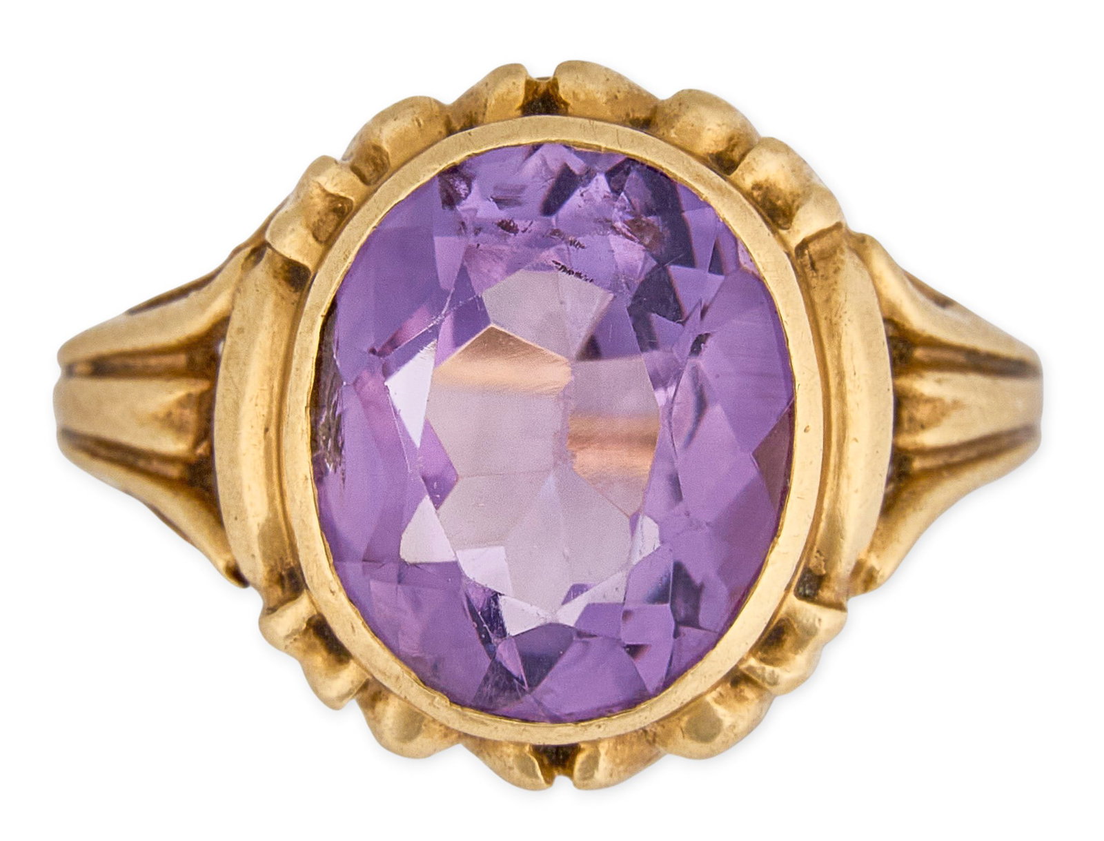 14K Amethyst Ring: 14K gold (tested) ring set with large oval-cut amethyst stone Size: 6.5 Total weight: 3.85 g Provenance: Property from a home in the Alamo Heights neighborhood of San Antonio, Texas