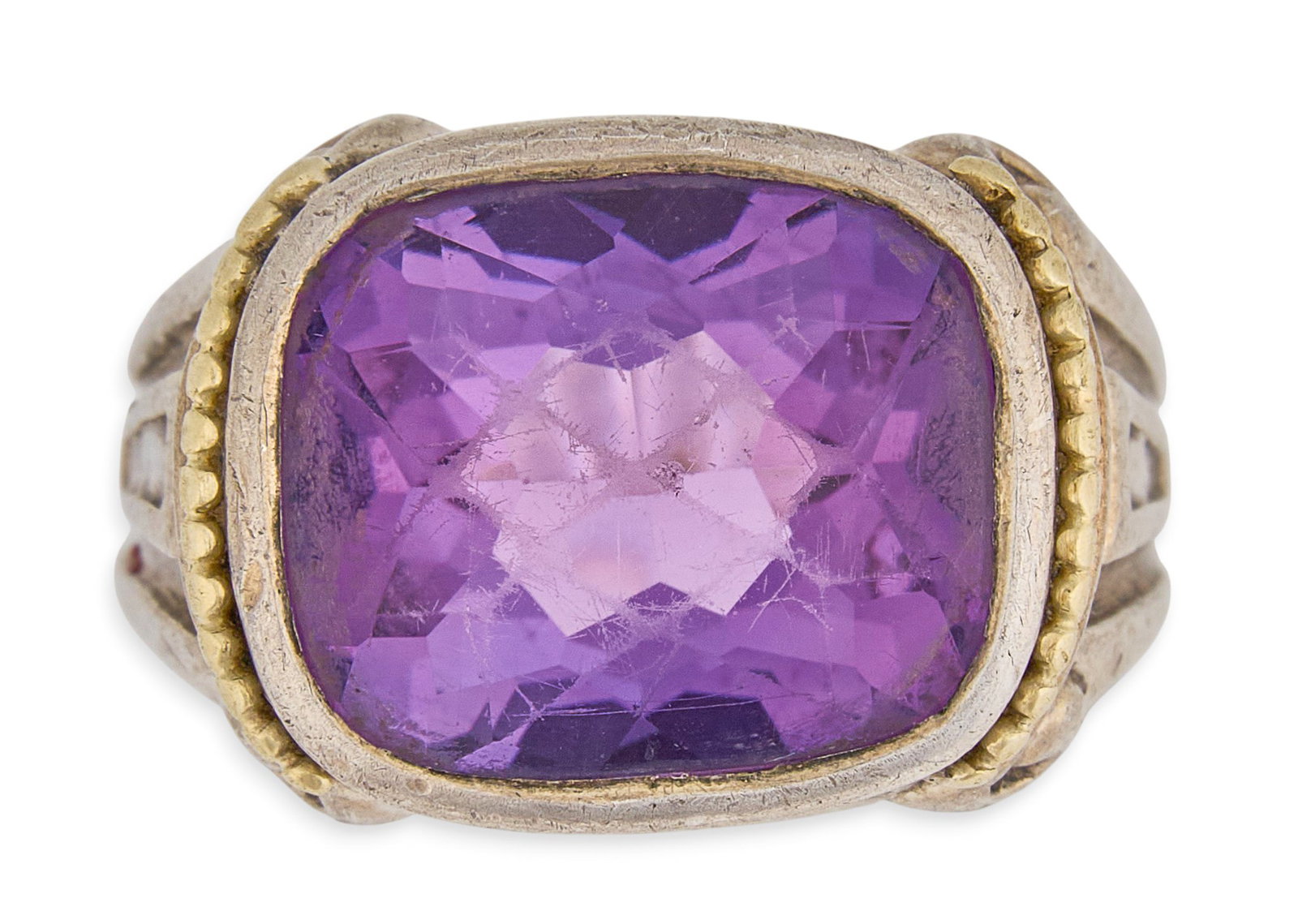 Sterling/18K Amethyst Cocktail Ring: Sterling silver ring set with faceted amethyst center stone and 18K gold details, marked "925 18K" Size: 6.5 Total weight: 10.9 g