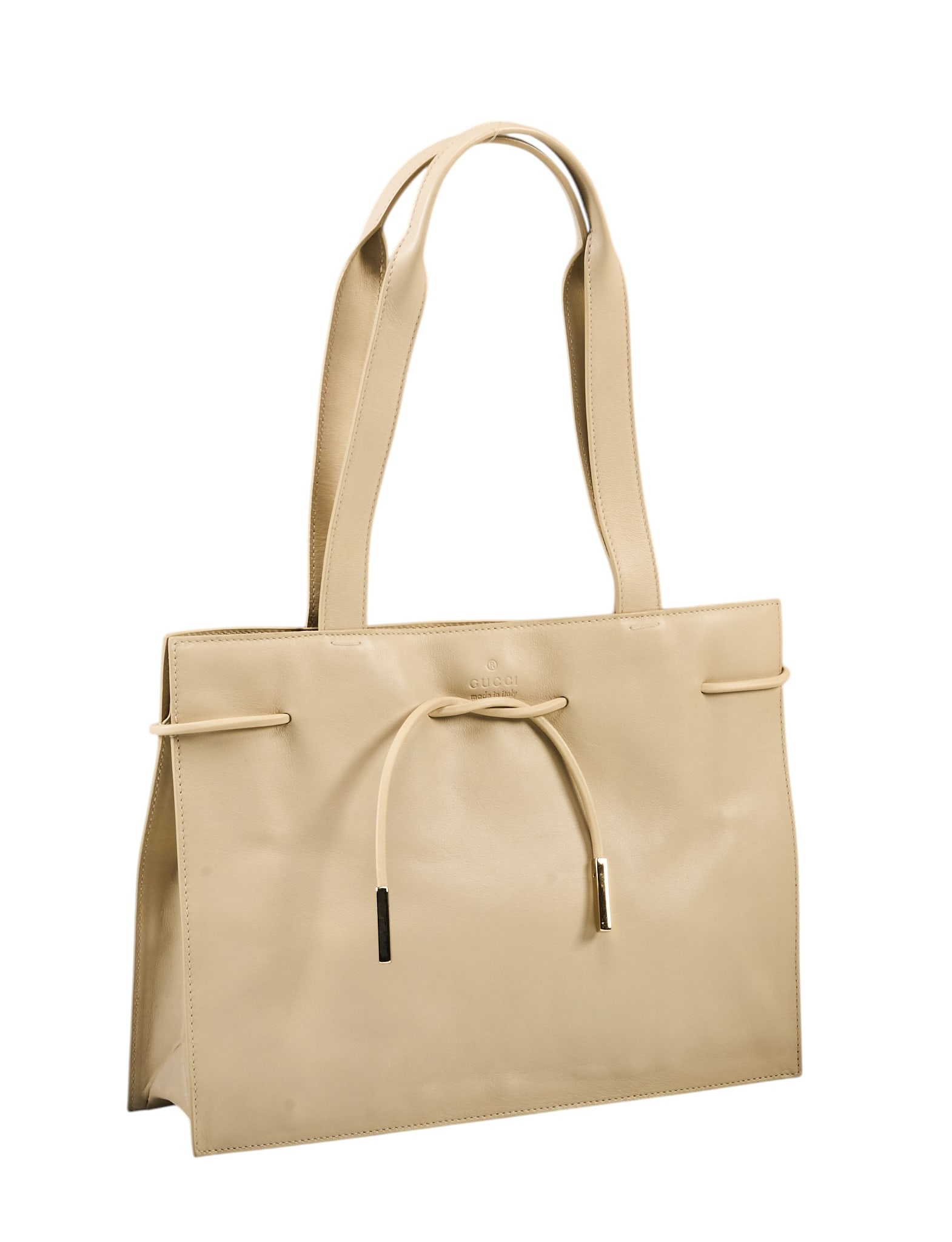 Gucci Drawstring Tote: Gucci drawstring tote in beige leather with golden hardware, marked 002 1053 3754 13 in. x 9 in. x 1.5 in. Provenance: Property from a home in San Antonio, Texas