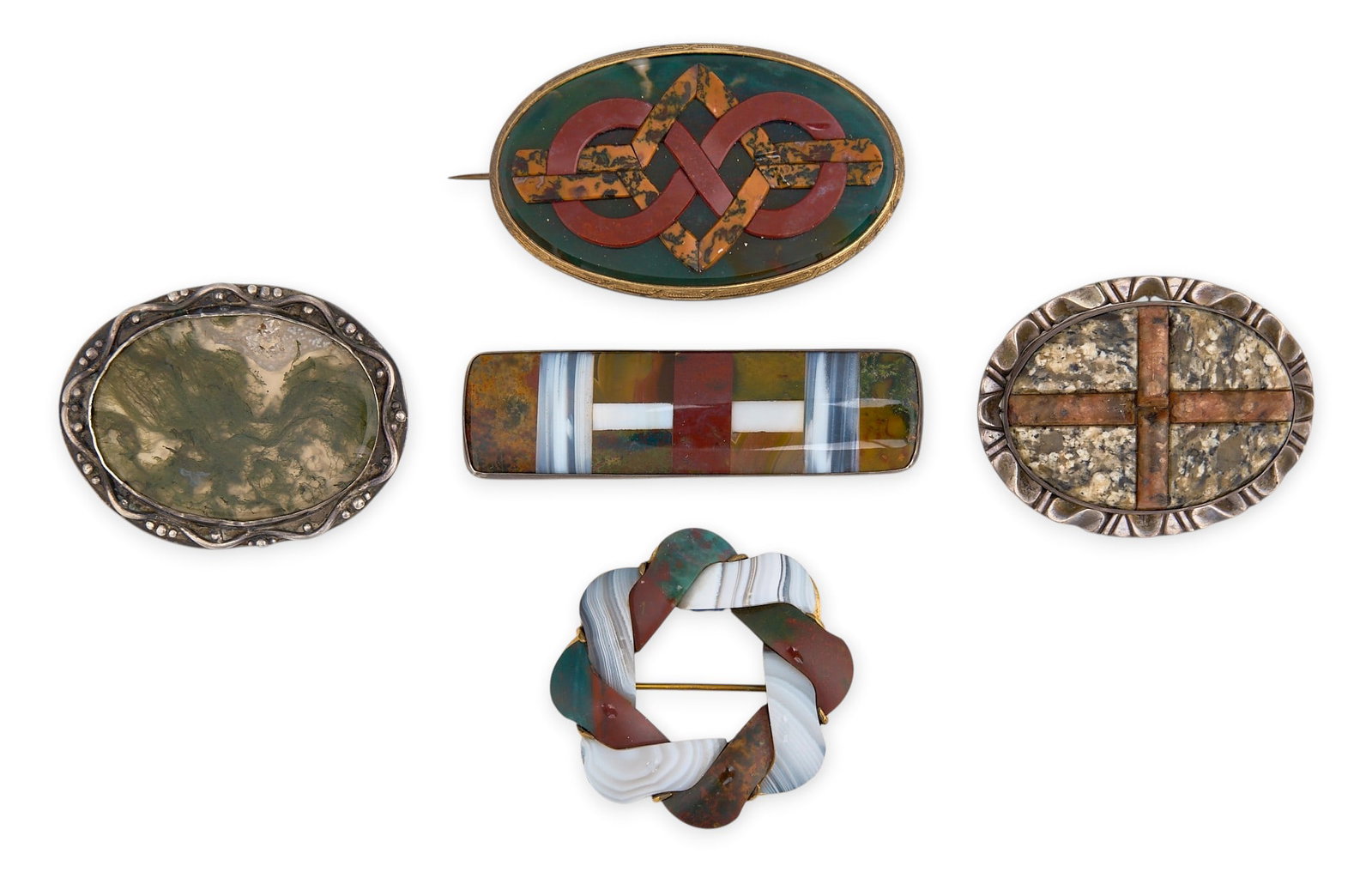 Collection of Scottish Brooches: Five Scottish Victorian agate brooches, various sizes and materials, one marked "9CT" Total weight 114.1 g Provenance: Property from a home in San Antonio, Texas
