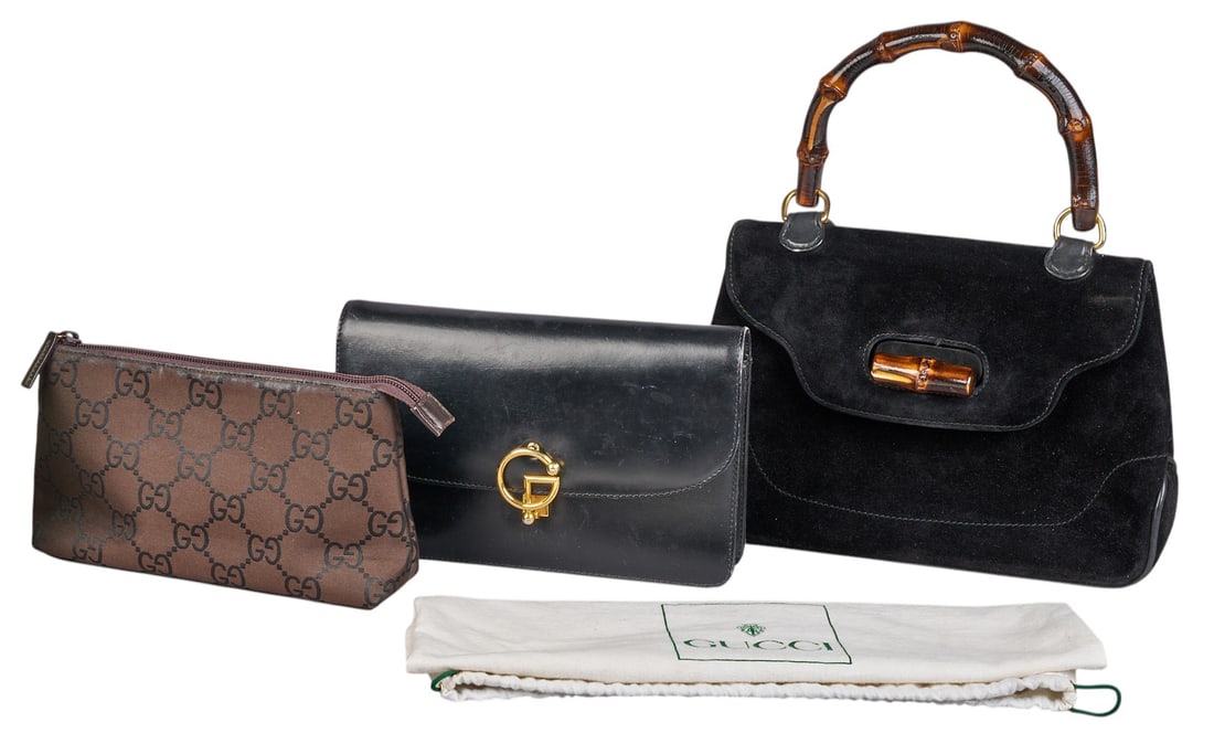 Collection of (3) Gucci Bags: Collection of three Gucci bags, includes monogram pouch, leather clutch, and suede bamboo handle bag height 13 in. x width 11 in. x depth 3 in. Condition AB; very good condition, regular wear si