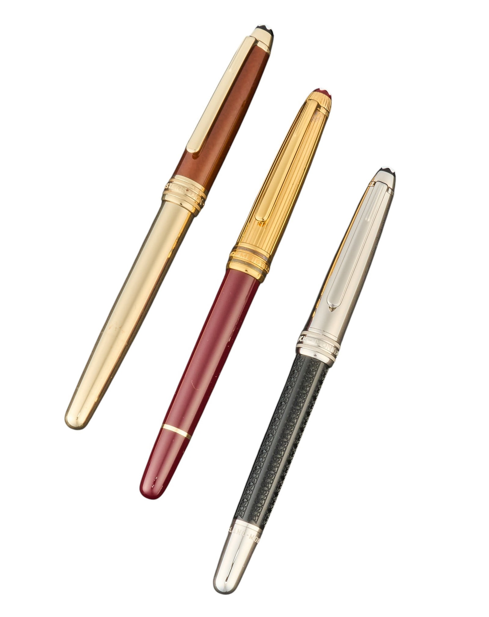 (3) Montblanc Meisterstuck Pens: Montblanc Meisterstuck Solitaire Doue vermeil and burgundy fountain pen with 18k white gold '4810' nib Montblanc Meisterstuck Doue Signum Solitaire rollerball pen, platinum plated with en