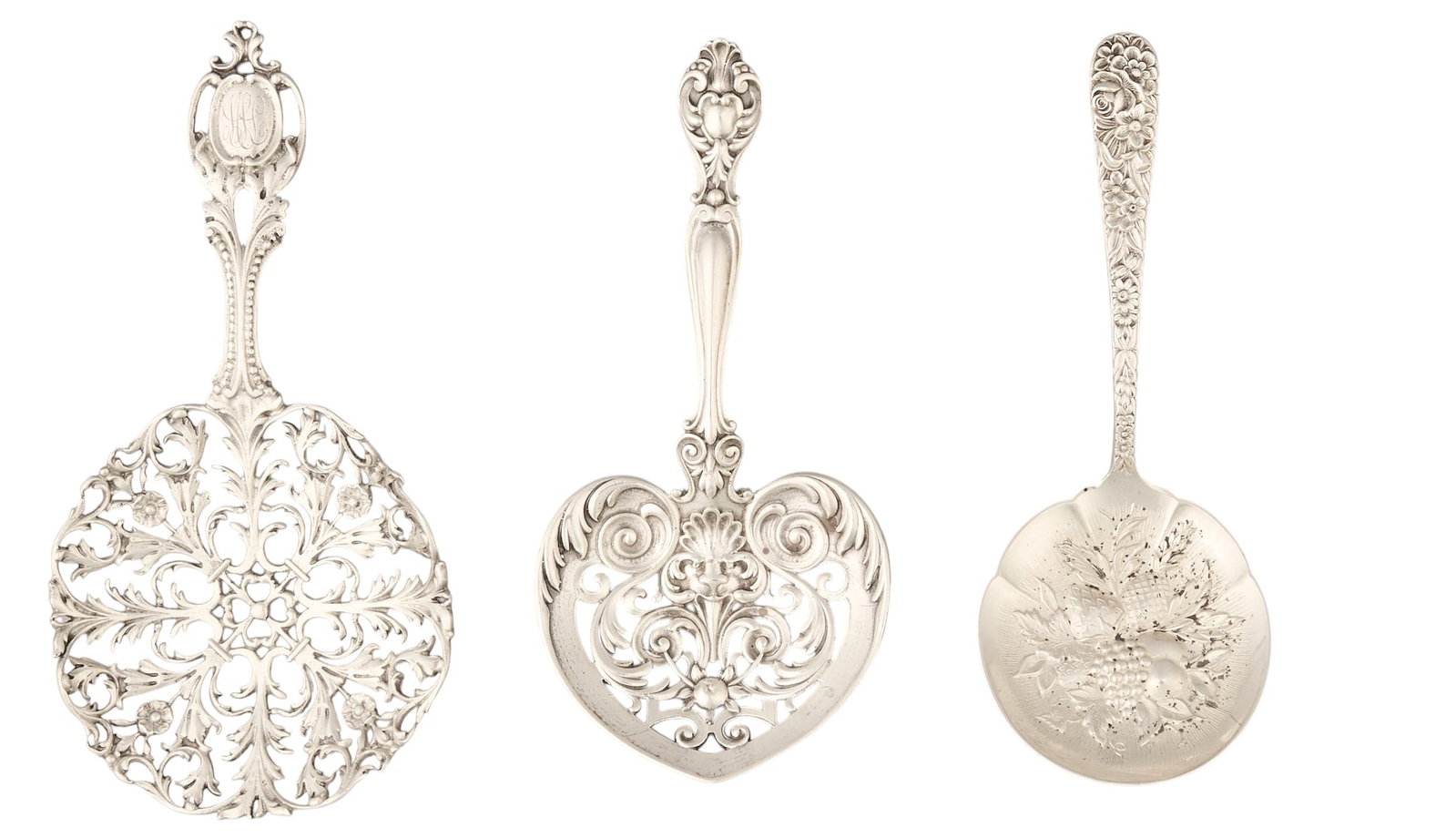 Three Small Reticulated Sterling Silver Repousse Servers: Three small reticulated sterling silver repousse servers height .25 in. x width 5.5 in. x depth 3 in. Total weight: 3.57 ozt (weighable silver) Provenance: Property from the collection of