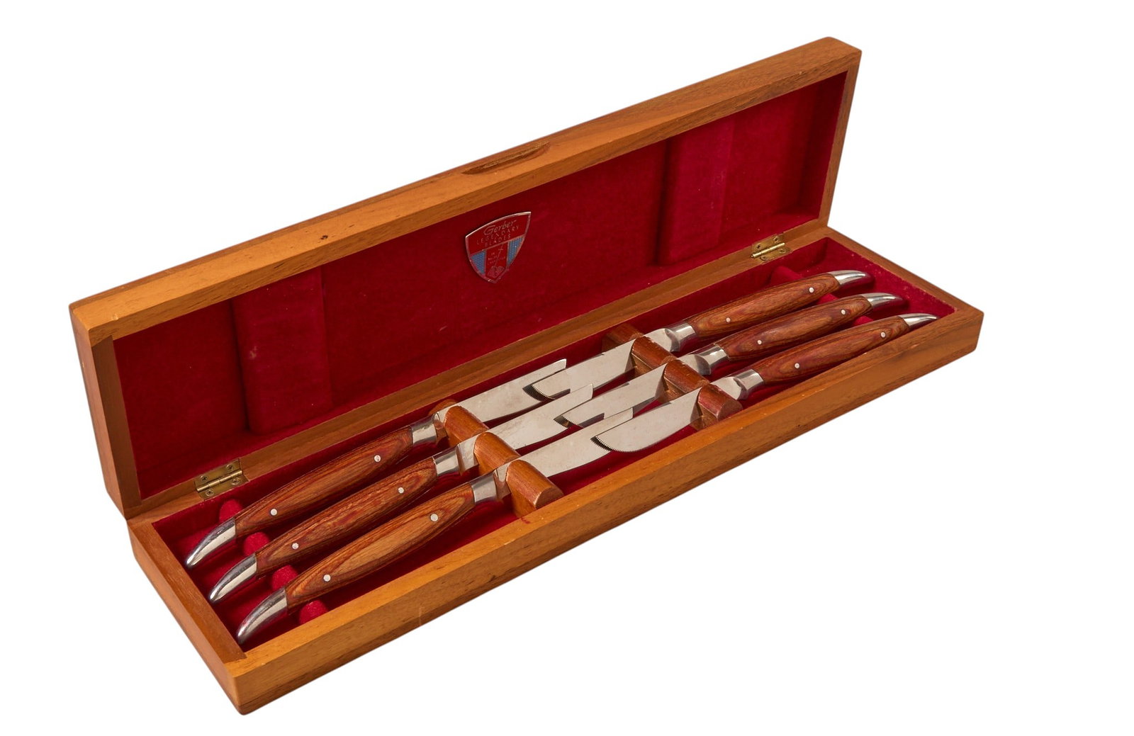 (6) Gerber Steak Knives with Wood Handles: Gerber steak knives with wood handles, includes original box height 2 in. x width 16 in. x depth 4 in. Provenance: Prope