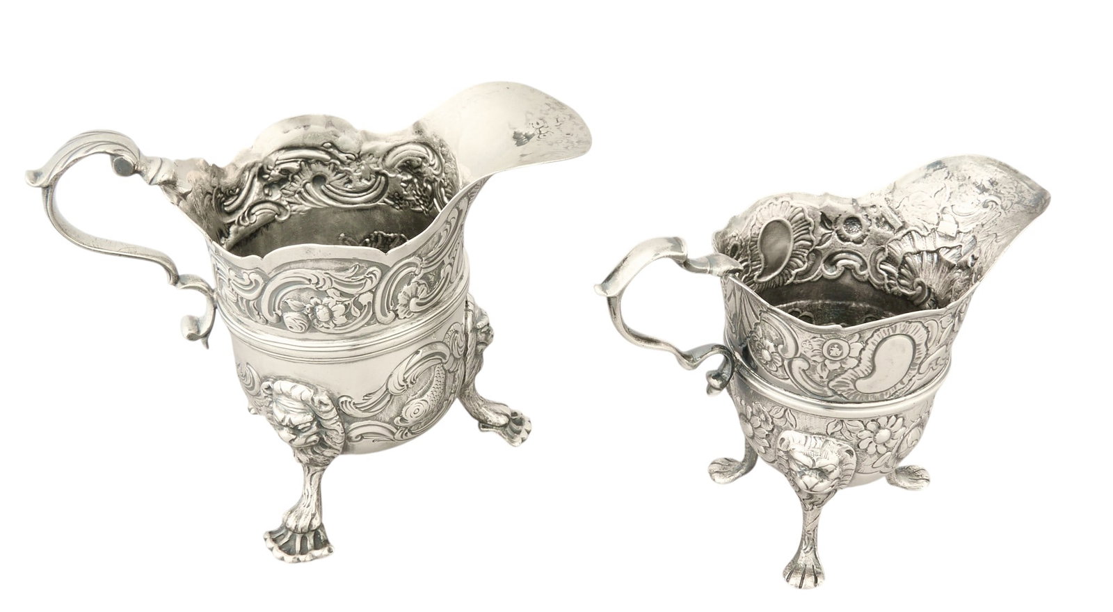 Pair of Irish Provincial Sterling Silver Pitchers: Pair of Irish provincial sterling silver pitchers height 4.5 in. x width 6 in. x depth 3.25 in. / each Total weight: 15.88 ozt (weighable silver) Provenance: Property from a home in San