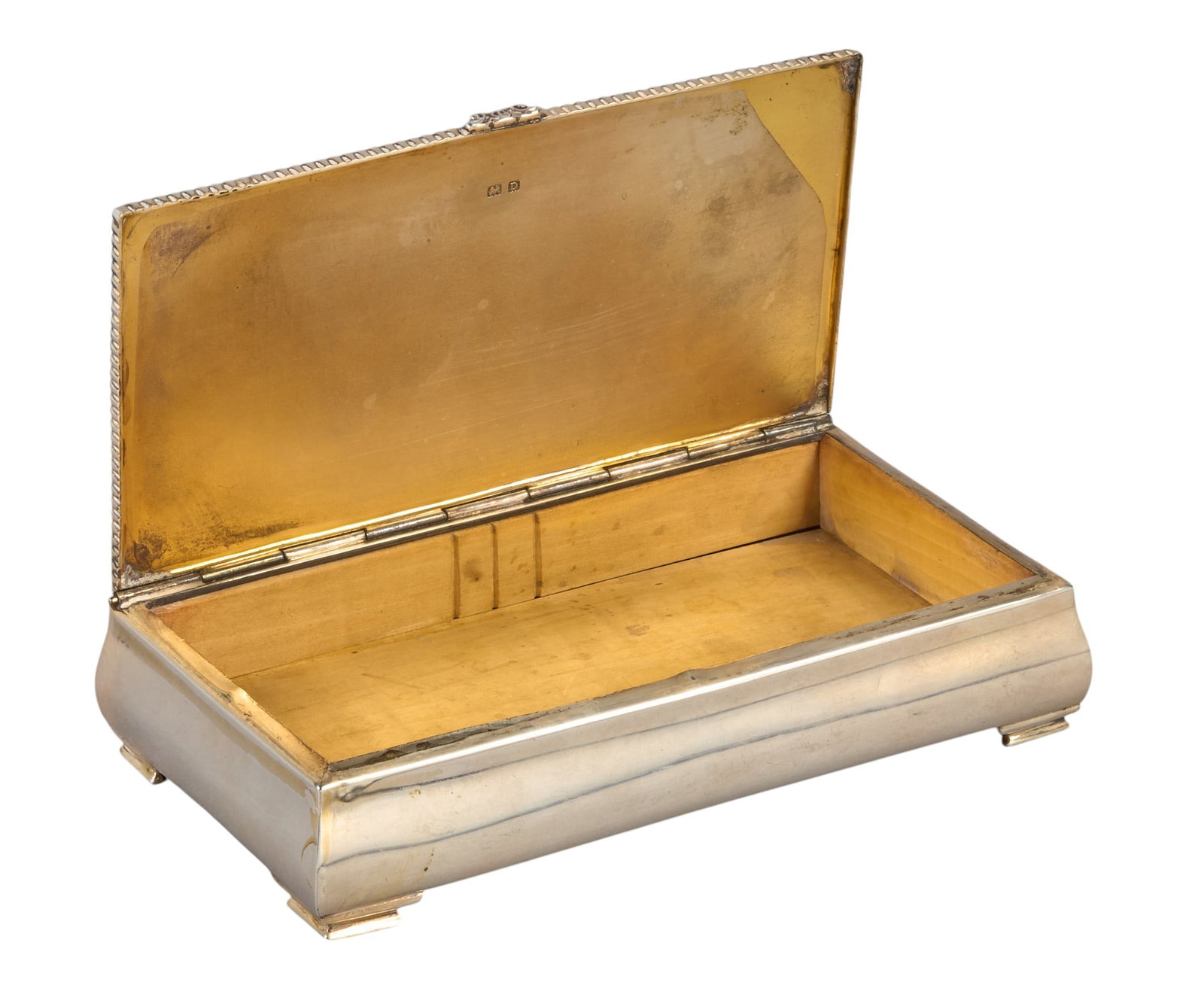 Sterling Silver English Box: Sterling silver covered wooden box height 7 in. x width 3.5 in. x depth 1.5 in. Total weight: 20 ozt Provenance: P