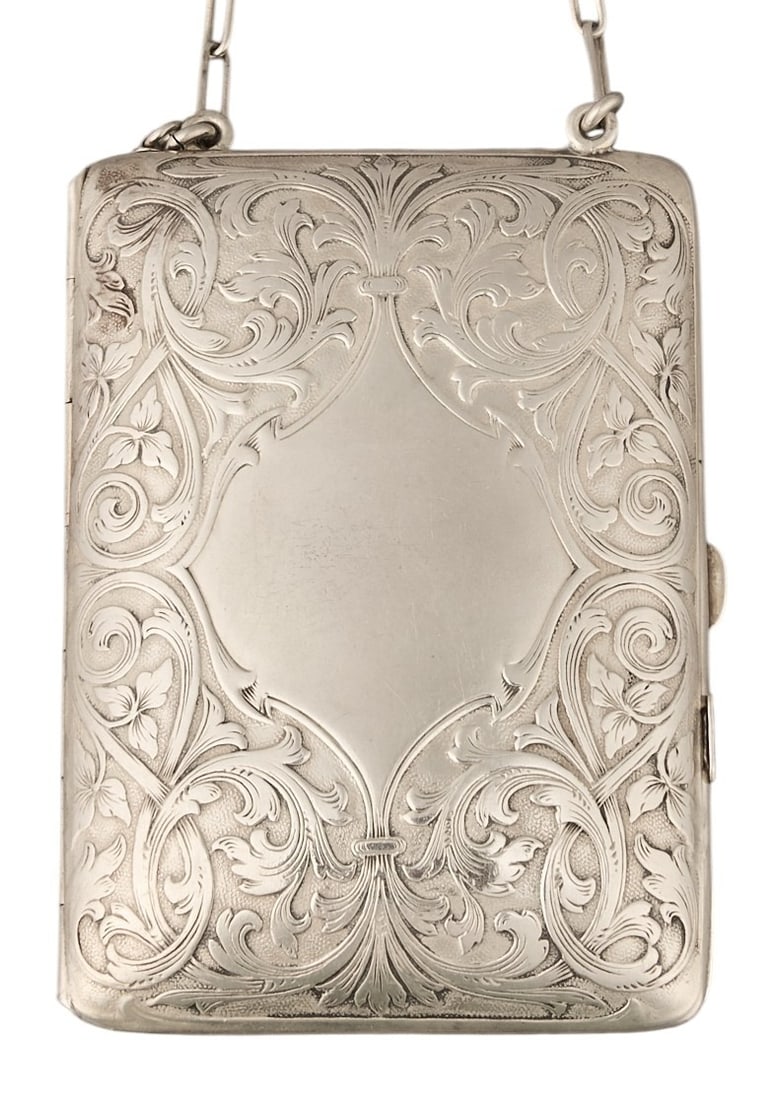 Sterling Silver Coin Purse: Sterling silver coin purse height 0.5 in x width 2.5 in. x depth 3.5 in Total weight: 3.29 ozt (weighable silver) Provenance: Property from the collection of an industrial chemicals