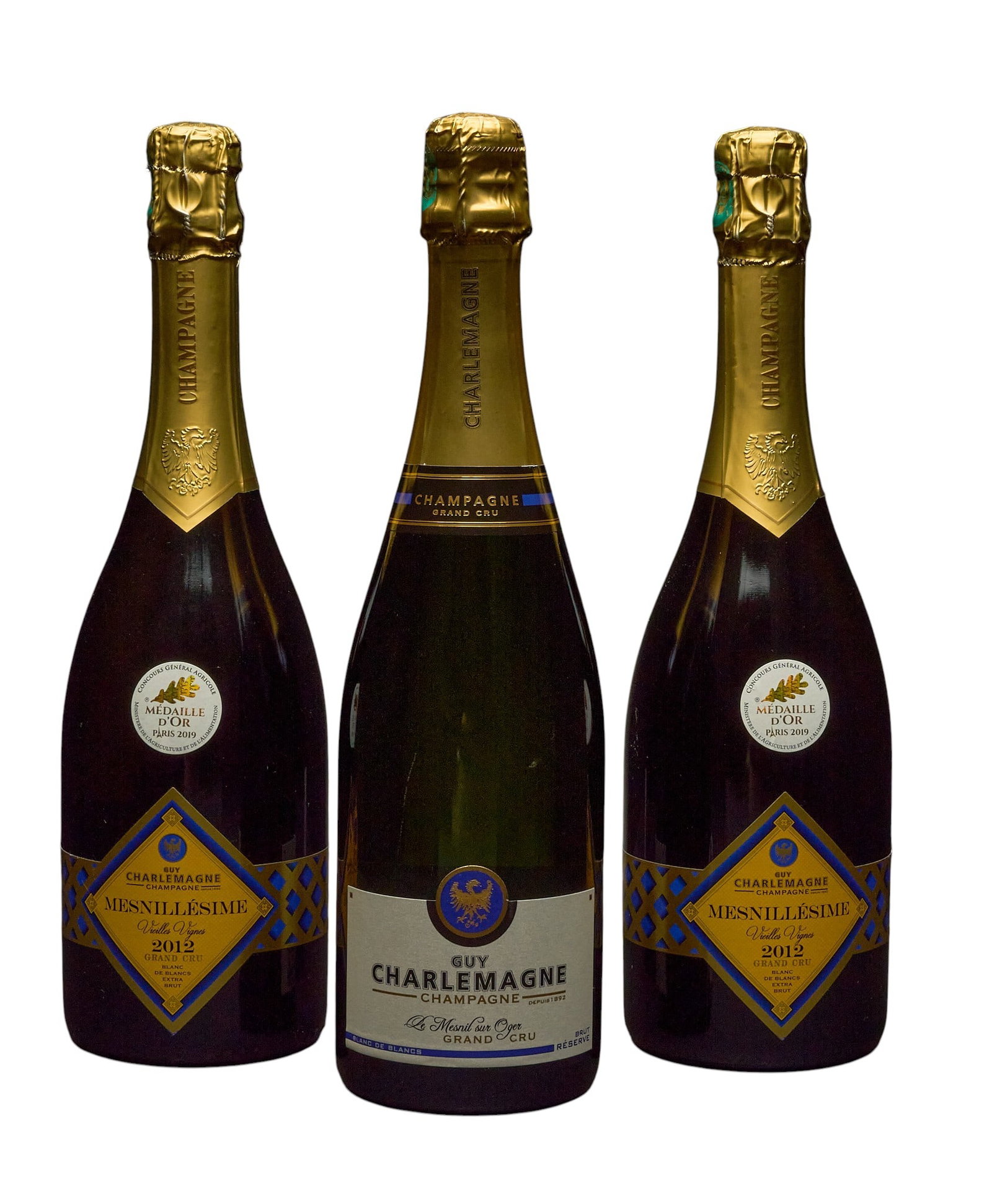 (3) Guy Charlemagne Champagnes: Three bottles of Guy Charlemagne champagne: two bottles of 2012 Guy Mesnillesime Vieilles Vignes Champagne, one bottle of Le Mesnil sur Oger Champagne Grand Cru Provenance: Property from the