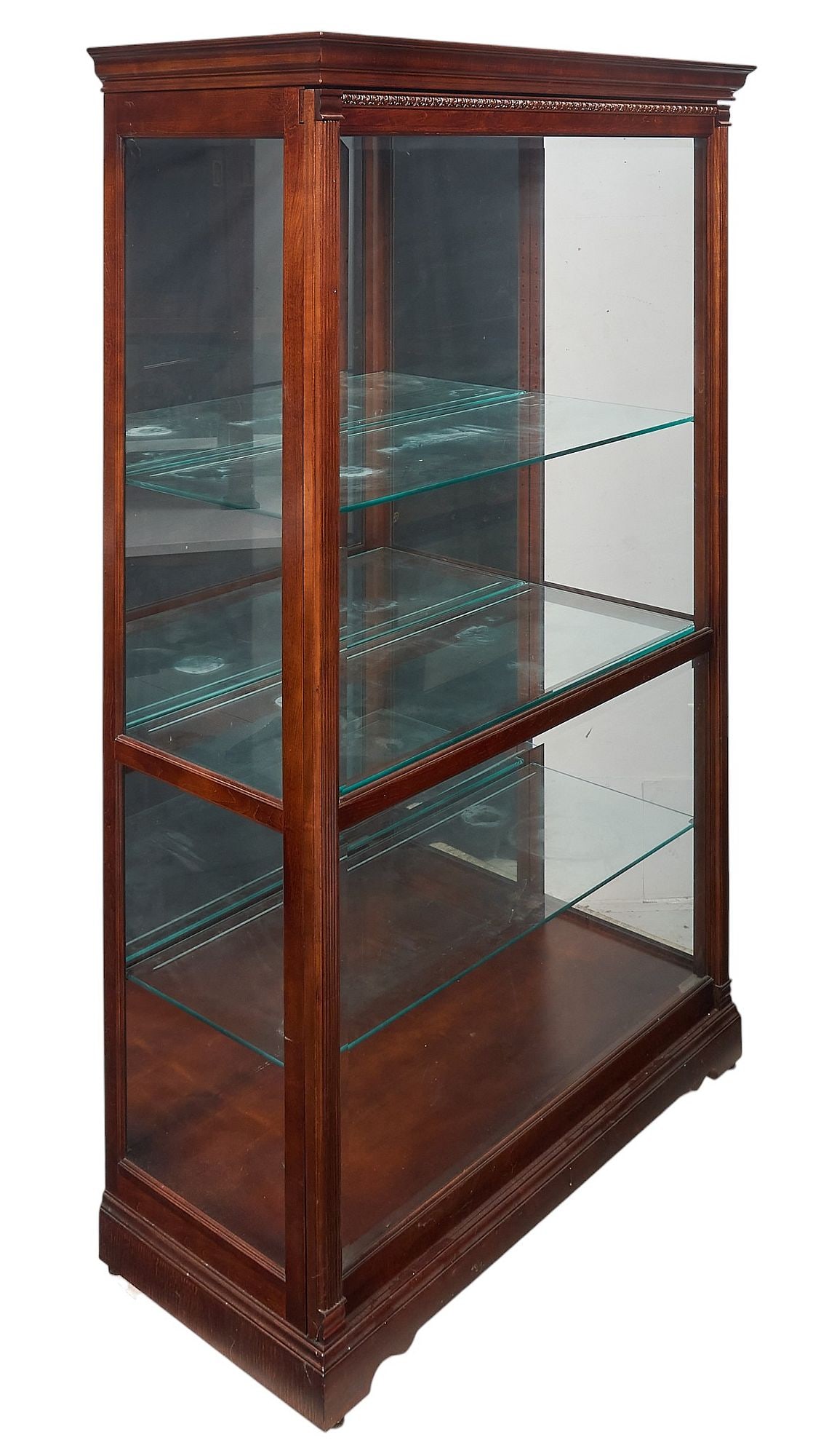 Howard Miller Collectors Cabinet: Howard Miller (Zeeland, Michigan) Collectors Cabinet with three glass shelves, and lighting system, in working condition, marked with sticker label height 80 in. x width 50 in. x depth 22 in. 