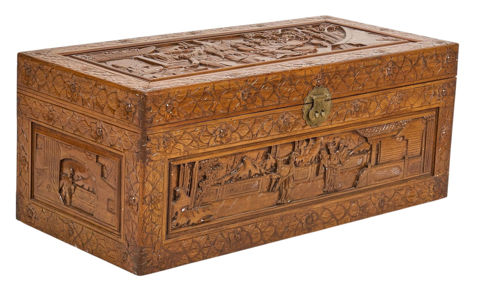 Carved Chinese Trunk: Chinese camphor wood trunk, elaborately carved with figural scenes and floral motifs height 17 in. x width 41 in. x depth 20 in. 