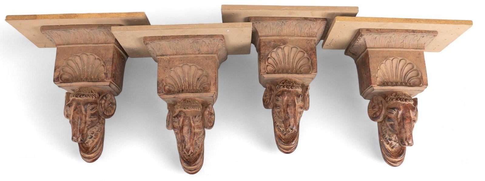 Set of Ram Head Wall Shelves: Set of four matching ram head wall shelves height 20 in. x width 20 in. x depth 11 in. / each Provenance: Property from a home in San Antonio, Texas