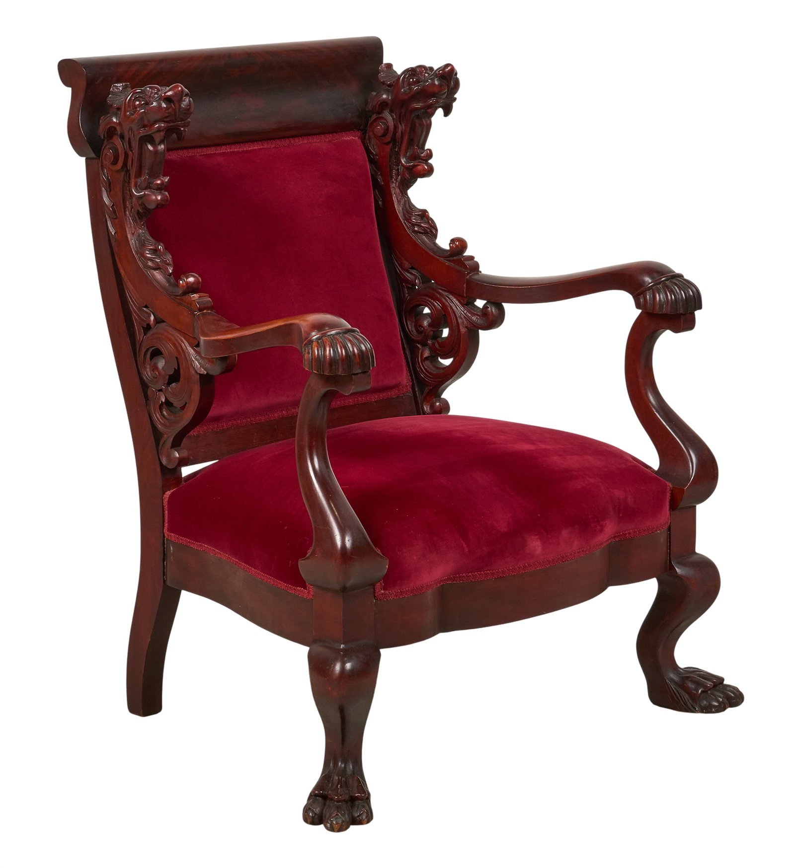 Victorian Armchair: Victorian armchair, with red velvet upholstery and carved wooden frame height 30 in. x width 39 in. x depth 25 in. Provenance: Property from a home in San Antonio, Texas