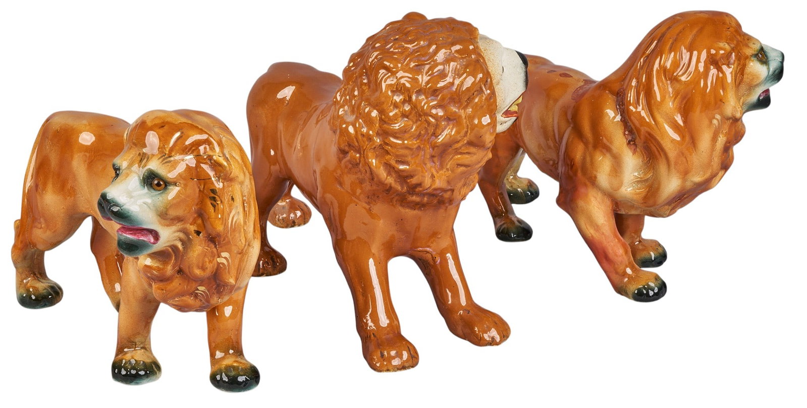 Collection of (3) Staffordshire Lions: Collection of (3) Staffordshire Lions, one pair of same style height 9 in x width 4 in. x depth 13 in. Provenance: Property from a home in San Antonio, Texas 