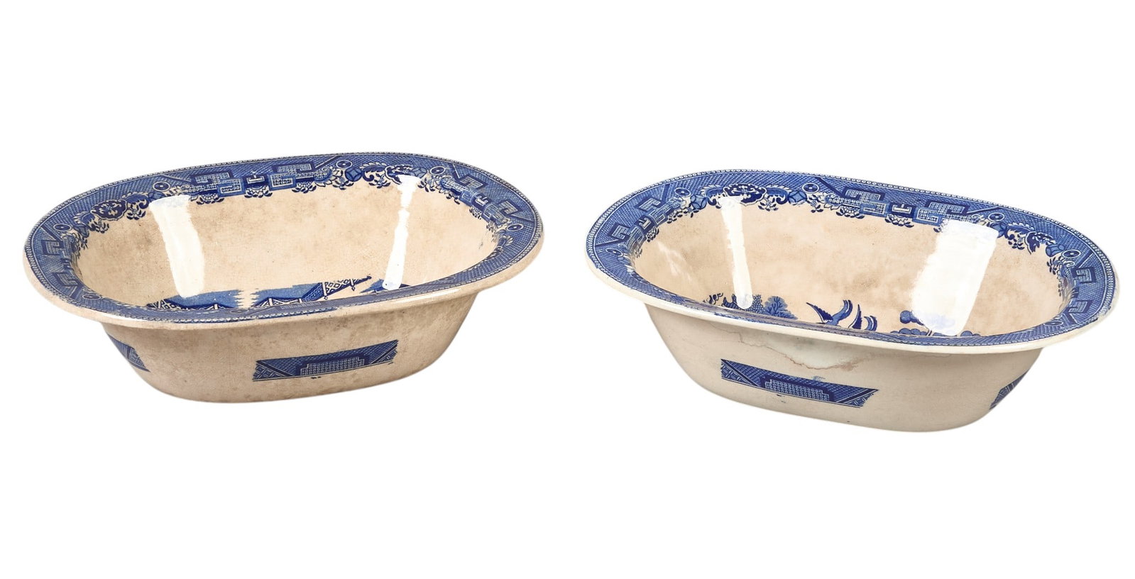 Set of (2) Crown Pottery "Blue Willow" Serving Bowls: Set of (2) Crown Pottery "Blue Willow" serving bowls height 3.5 in. x width 13 in. x depth 10.5 in. Provenance: The estate of prominent Austin, Texas attorney George Cowden 