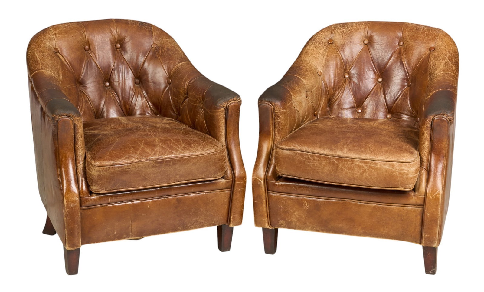 Pair of Tufted Club Chairs: Pair of distressed leather club chairs with tufting, and wooden legs height 31 in. x width 28 in. x depth 26 in. / each