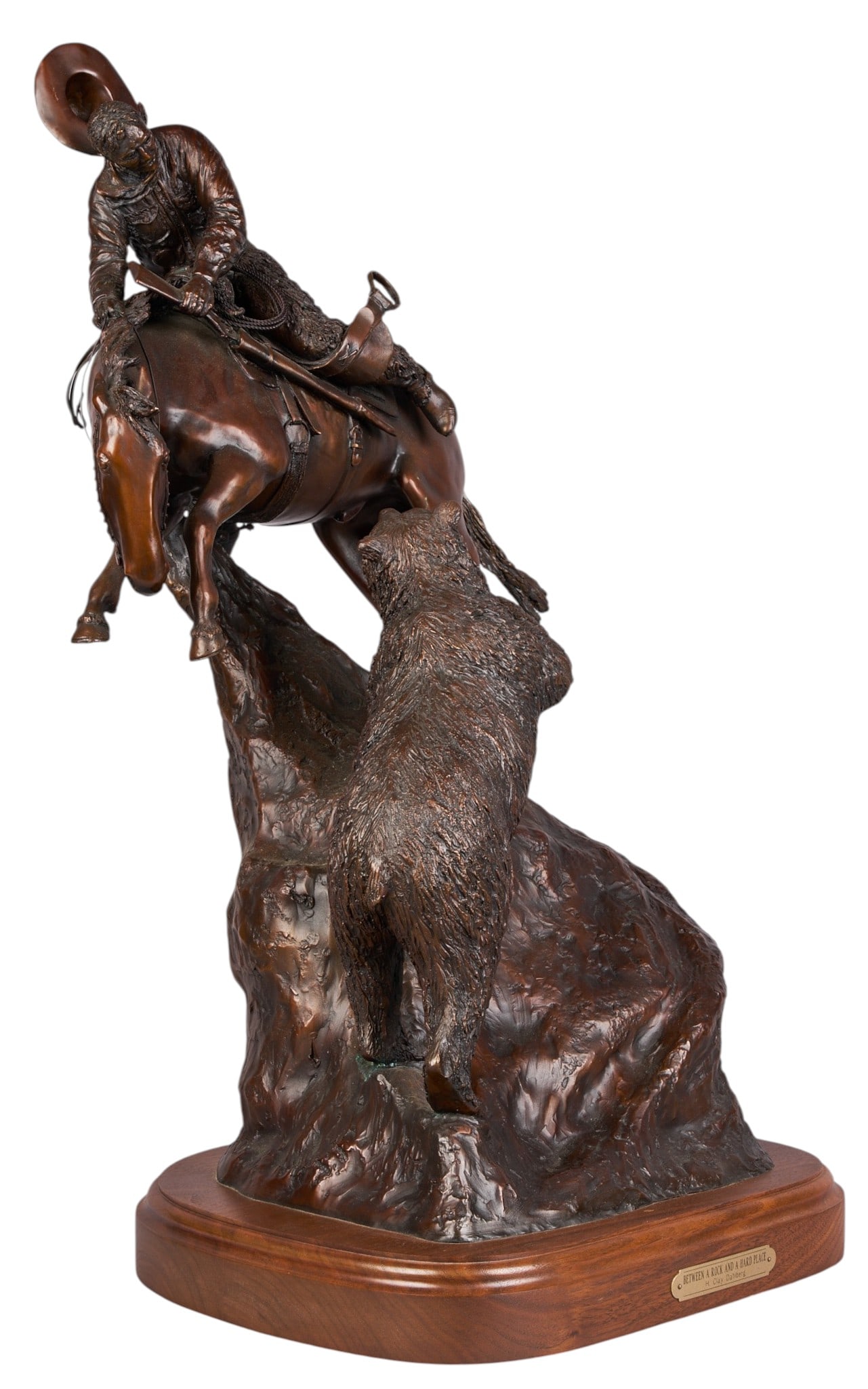 H. Clay Dahlberg, "Between a Rock and a Hard Place": Houston Clay Dahlberg (Texas, 1946-2021), "Between a Rock and a Hard Place", bear attacking cowboy, artist-cast bronze sculpture on wooden base, with incised signature, edition number