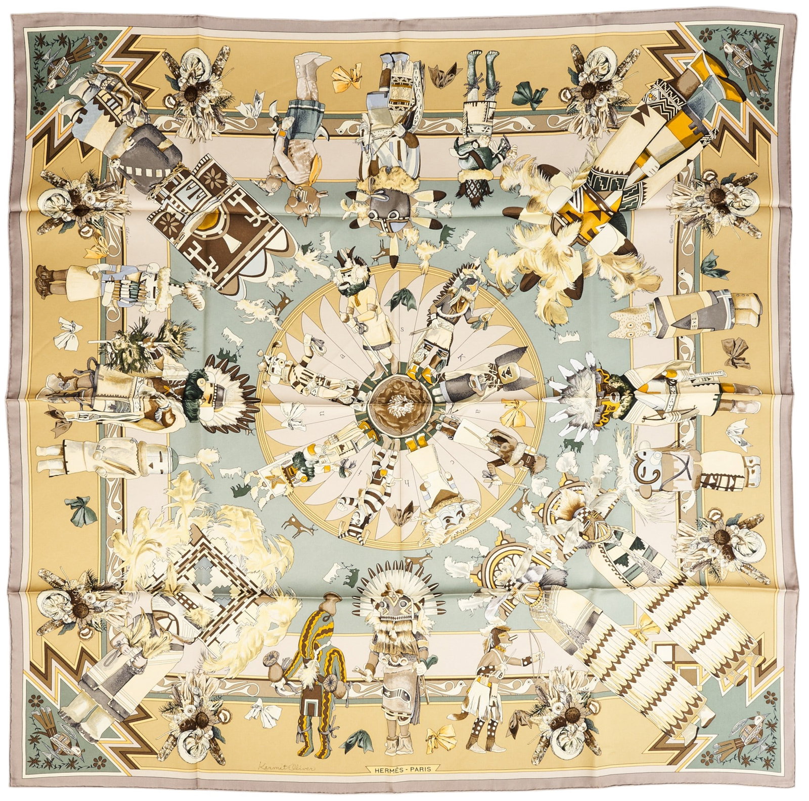 Kermit Oliver / Hermès, "Kachinas" Hand-Signed Scarf: Kermit Oliver (Texas, b. 1943) designing for Hermès Paris, "Kachinas", silk square scarf with pale taupe colorway, hand-signed by the artist in pen (lot includes photo of Oliver