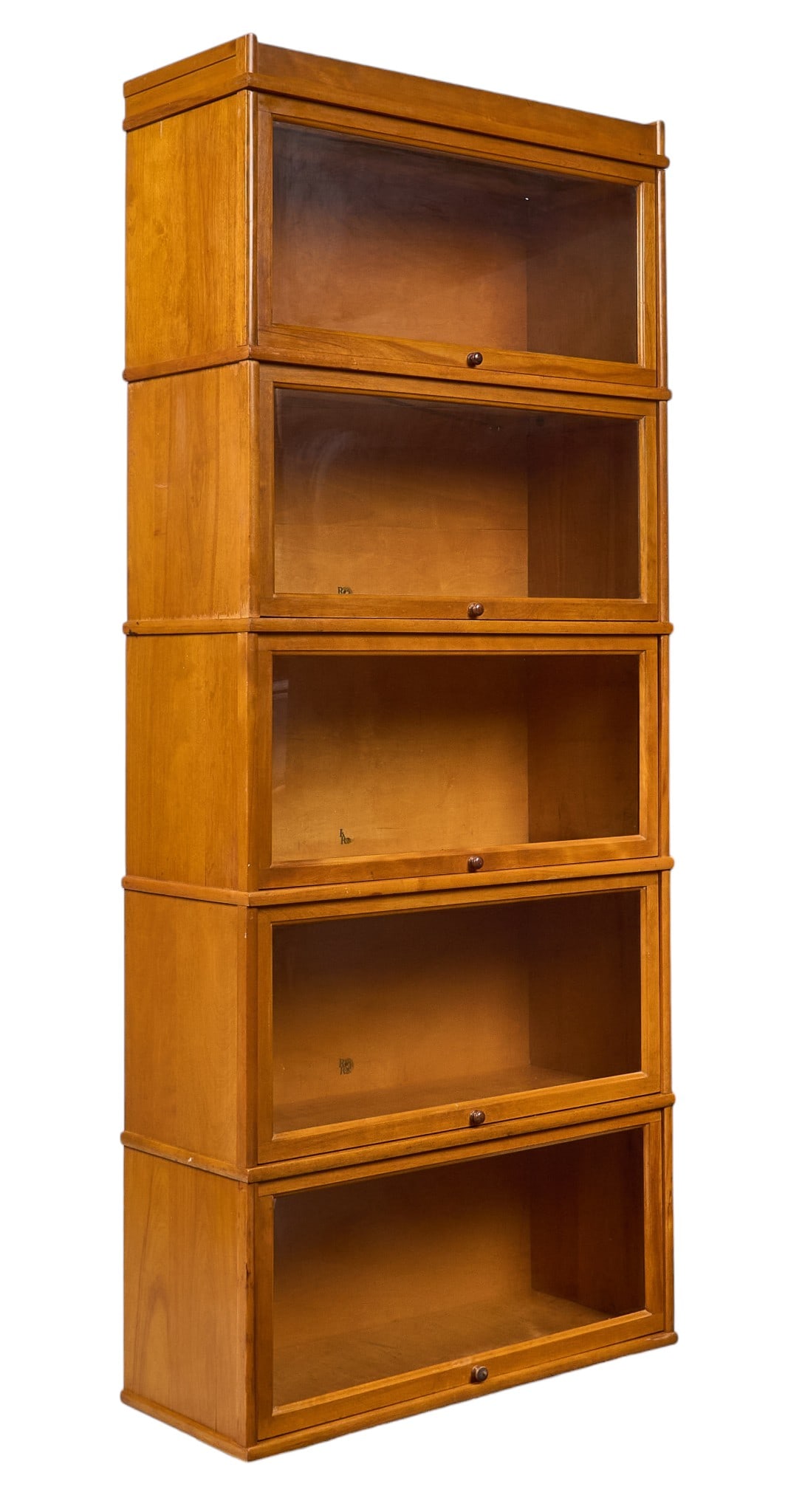 Remington Rand Mid-Century Stacking Bookcase: Remington & Rand, Library Bureau Division stacking modular bookcase with five glass-front tiers with crown, circa 1950s height 81 in. x width 34.5 in. x depth 13.5 in. Provenance: Property f
