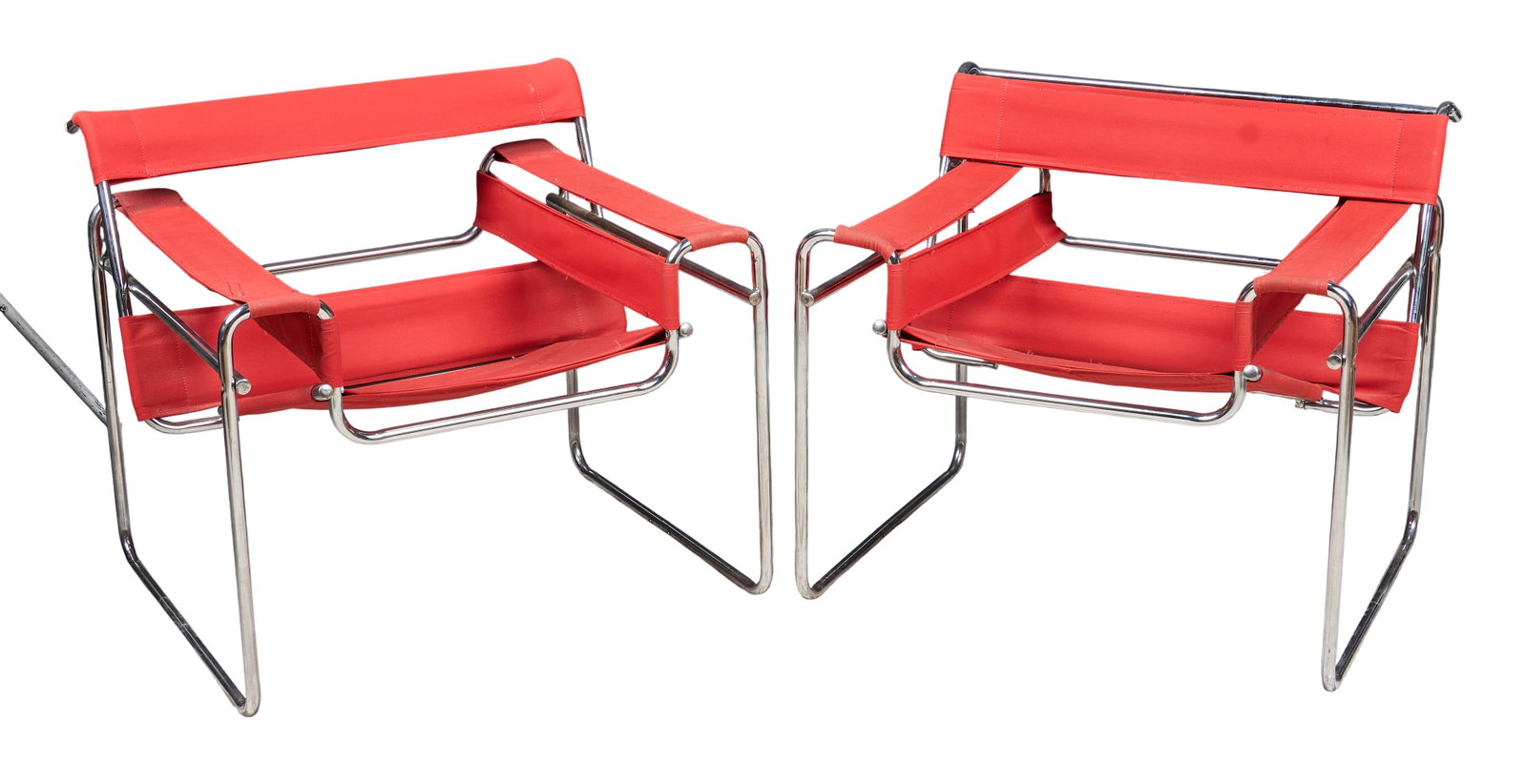 Marcel Breuer, Pair of Wassily Chairs: Pair of Marcel Breuer (1902-1981) for Knoll, Wassily chairs with red canvas seats on chrome frames height 28 in. x width 31 in. x depth 29 in. / each Provenance: Property from a home in San