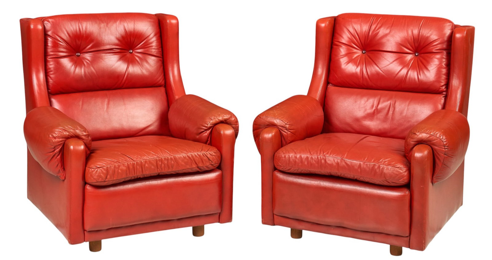 Pair of Danish Mid-Century Leather Lounge Chairs: Pair of Danish mid-century red leather lounge chairs, featuring button-tufted backs and padded armrests height 37 in. x width 32 in. x depth 35 in. / each