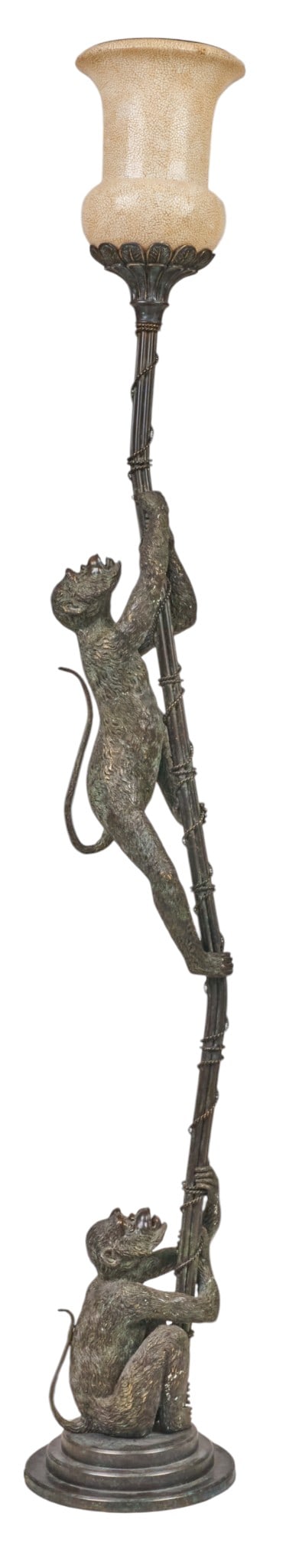 Hollywood Regency Style Monkey Lamp: Hollywood Regency-style floor lamp, patinated metal figural standard modeled as two climbing monkeys on a bamboo-form support, foliate candle cup with crackle-glazed glass shade, raised on a stepped c
