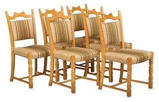 Set of (6) Henning Kjaernulf Mid-Century Oak Dining Chairs: Set of six Henning Kjaernulf (Denmark) mid-century oak dining chairs, with beige and green striped upholstered cushions, carved crest, rising on carved block stretchered legs height 37 in. x width 18