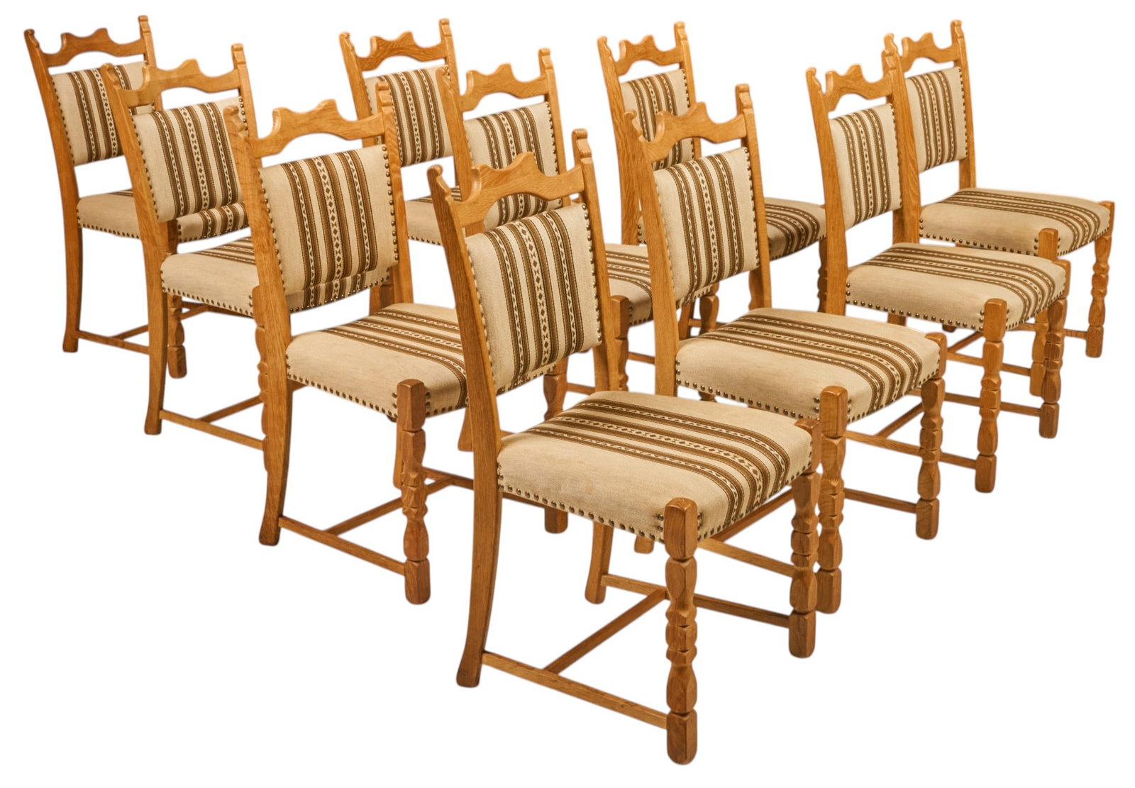 Set of (10) Henning Kjaernulf Dining Chairs: Set of ten Henning Kjaernulf (Denmark) oak mid-century dining chairs, with striped upholstery, metal rivet trim, and turned legs height 36.5 in. x width 21 in. x depth 19 in. 