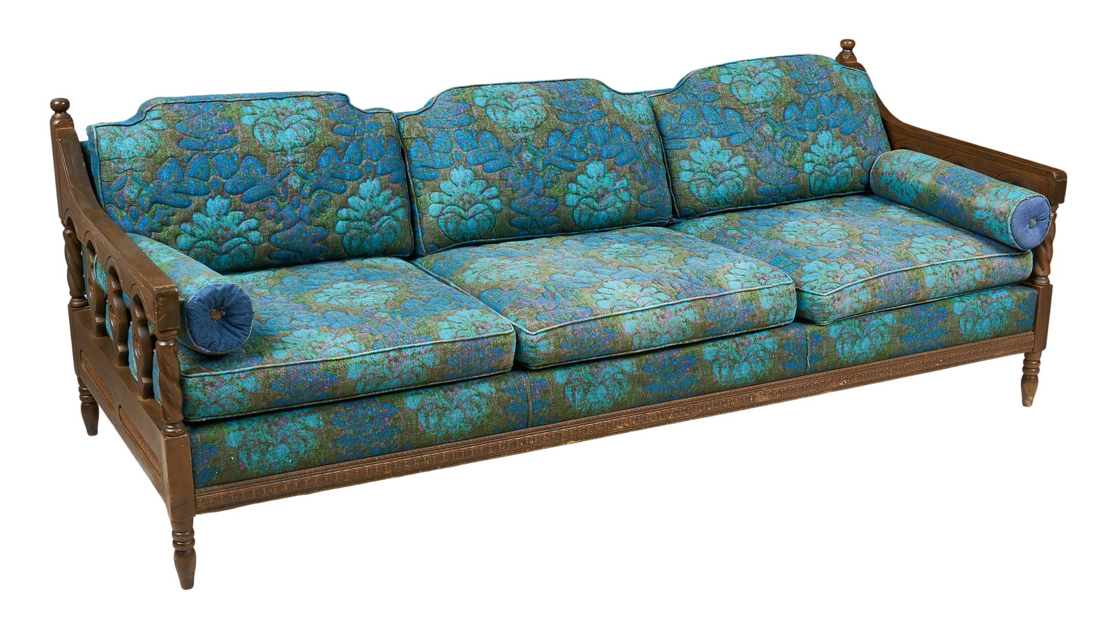 Floral Green and Blue Upholstered Sofa: Floral green and blue upholstered sofa, with carved wooden frame, featuring turned legs height 31.5 in x width 34 in. x depth 83.5 in Provenance: Property from a home in San Antonio, Texas