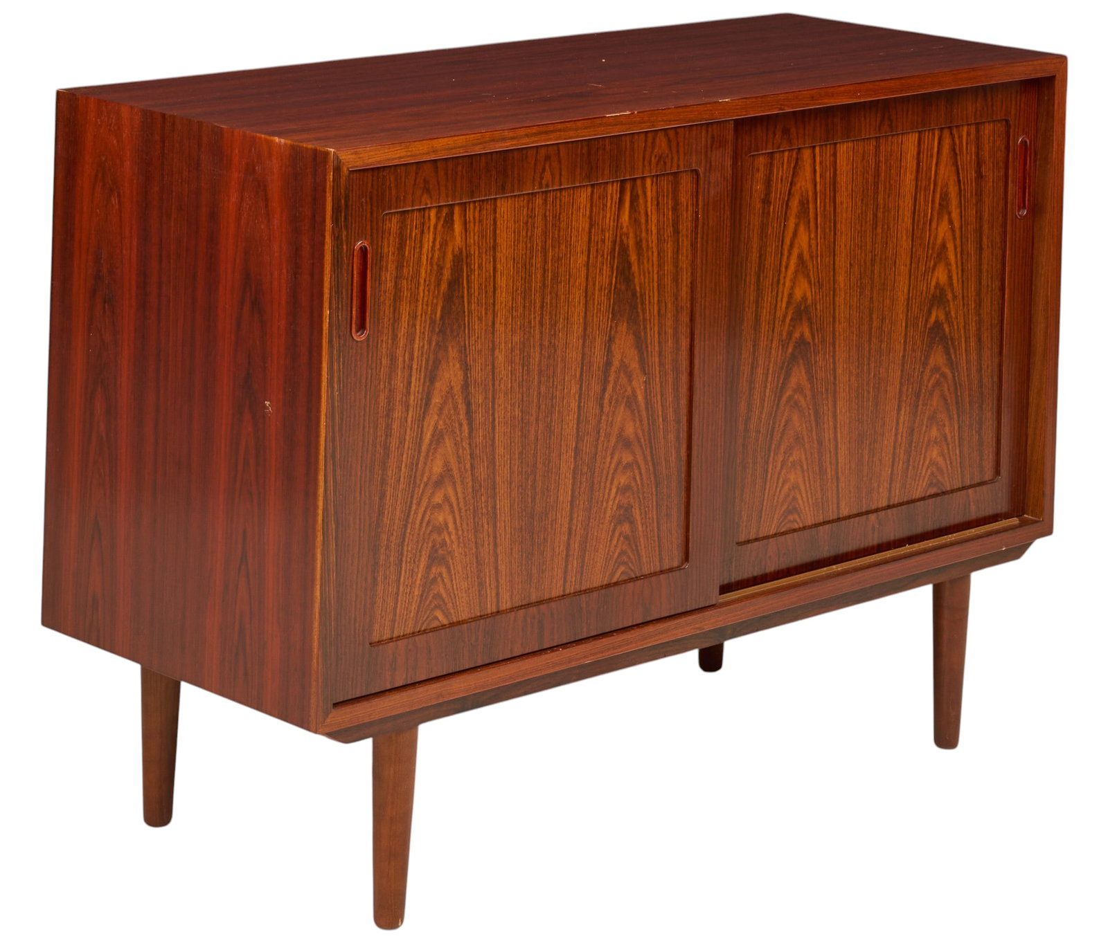 Danish Mid-Century Credenza: Danish mid-century credenza with pair of sliding paneled doors opening to interiors with shelving and one extending felt-lined tray, supported on pin legs height 30 in. x width 42.5 in. x depth 17