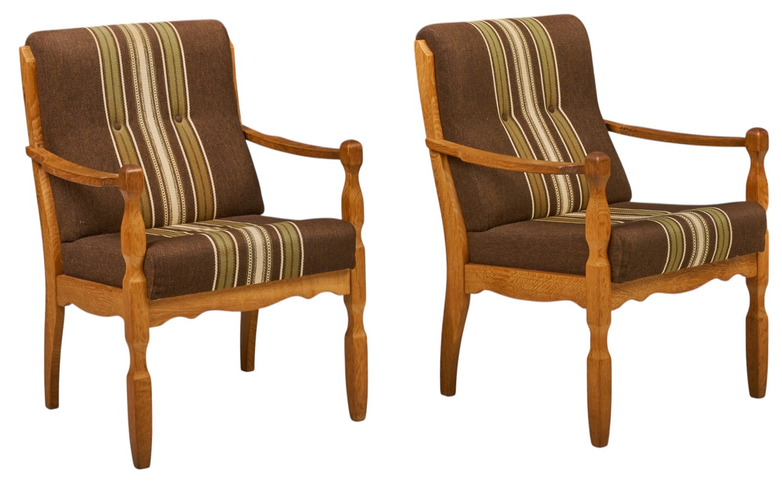 Pair of Henning Kjaernulf Mid-Century Armchairs: Pair of Henning Kjaernulf (Denmark) oak mid-century armchairs, with striped and button tufted cushions, supported on turned legs height 37 in. x width 25.5 in. x depth 27 in. 