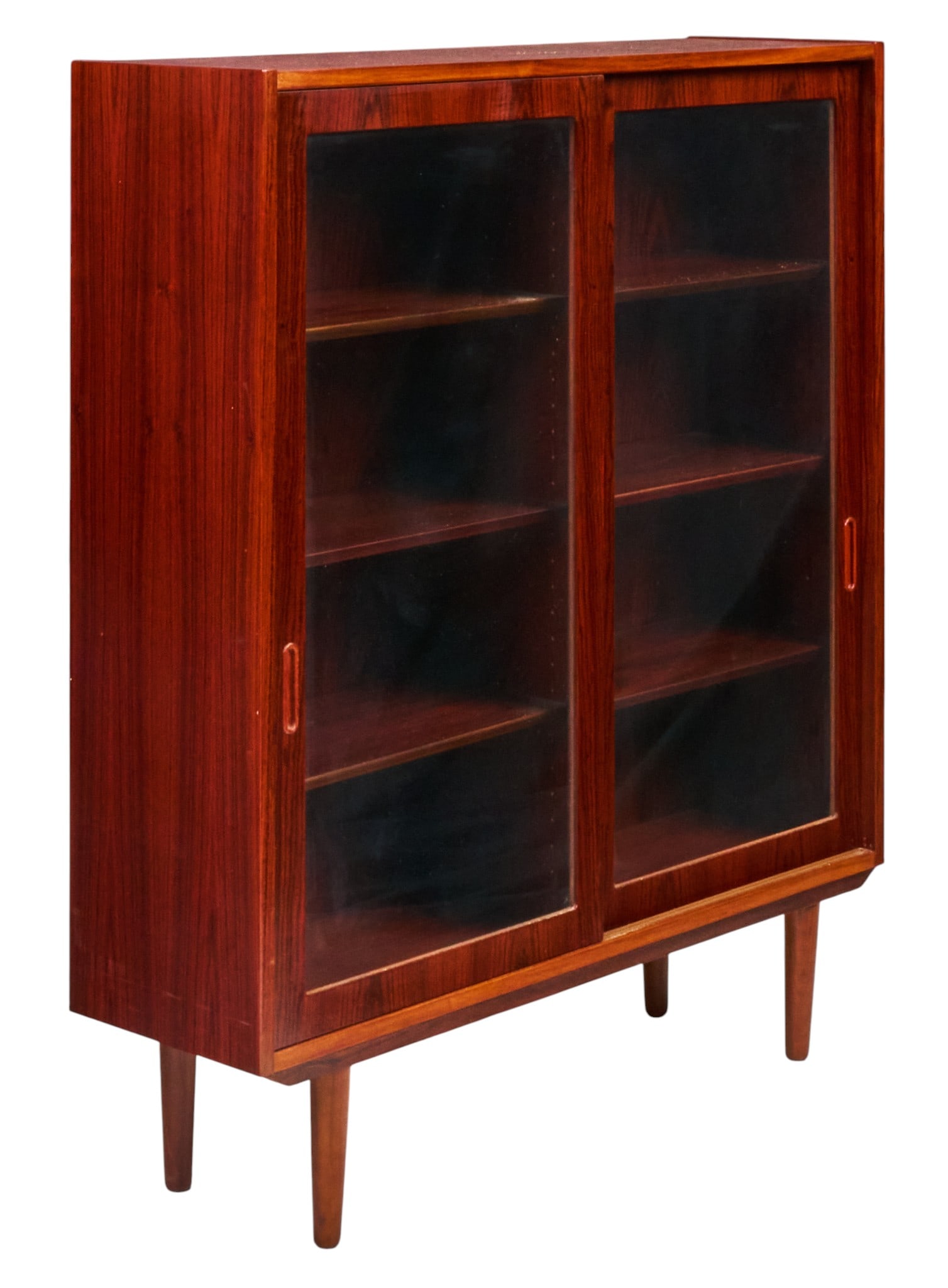 Danish Mid-Century Rosewood Display Cabinet: Danish mid-century rosewood display cabinet, pair of glazed sliding doors with recessed pulls, fitted interior shelves, raised on tapered legs height 49.5 in. x width 42.5 in. x depth 12 in.