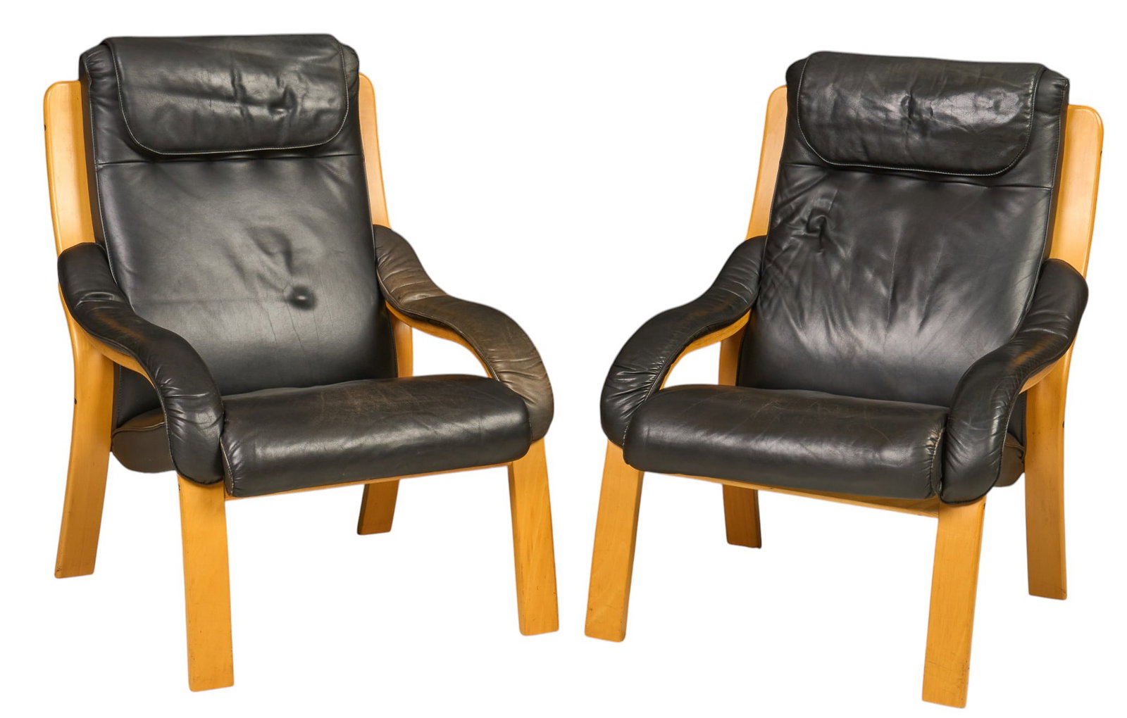 Pair of Danish Mid-Century Lounge Chairs: Pair of Danish mid-century armchairs, with black leather cushions and wooden frame height 37 in. x width 29.5 in. x depth 31 in. 