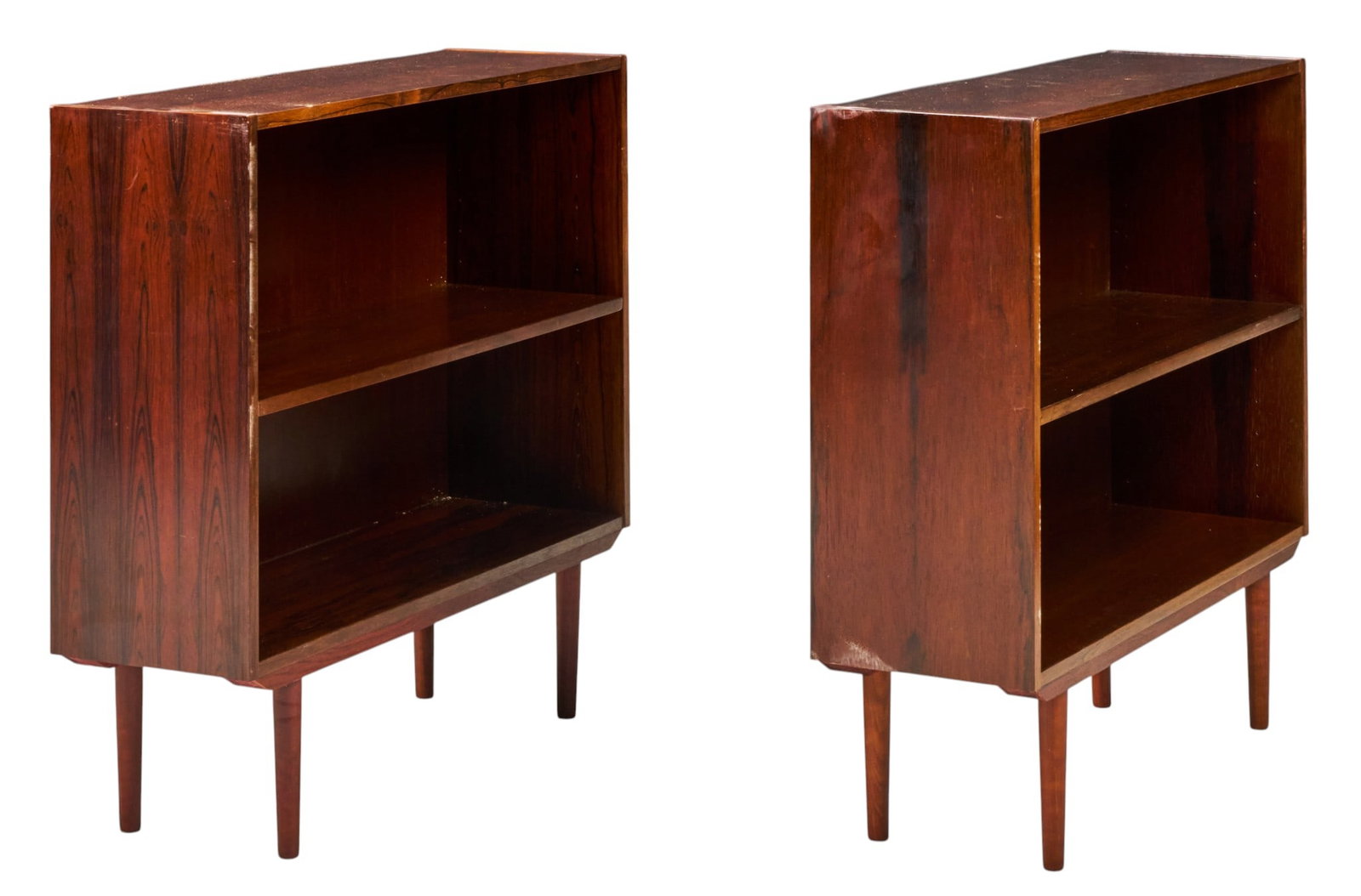 Pair of Danish Mid-Century Bookcases: Pair of Danish mid-century bookcases, each with single adjustable shelf, supported on pin legs height 32.5 in. x width 33.5 in. x depth 10.5 in. / each Condition: one bookcase wobbles slightly 