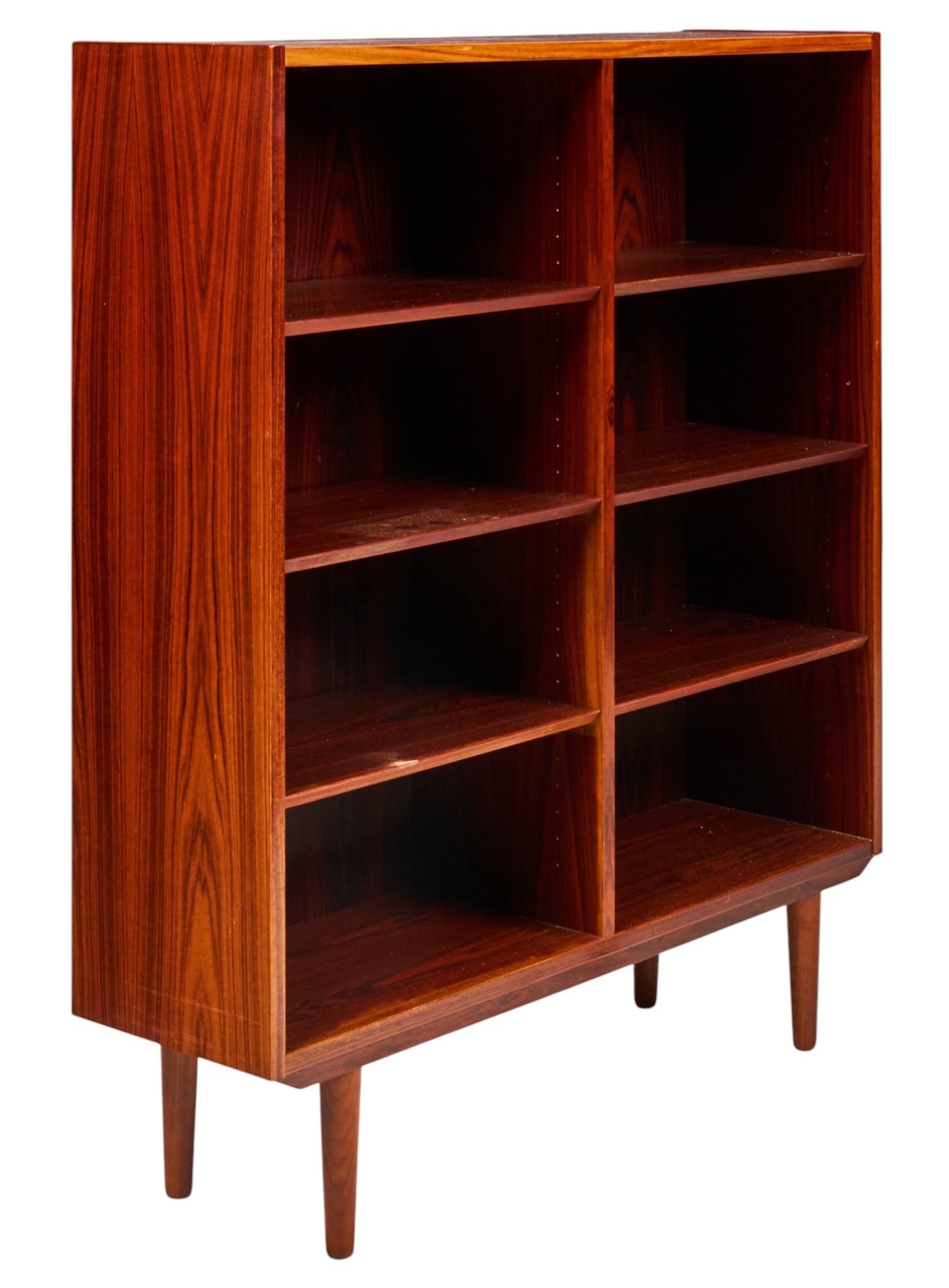 Danish Mid-Century Bookcase: Danish mid-century bookcase with six adjustable shelves, supported on pin legs height 49.75 in. x width 42 in. x depth 42 in. 