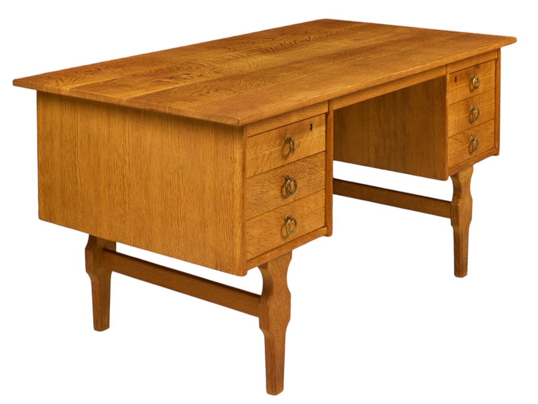 Henning Kjaernulf, Mid-Century Desk: Henning Kjaernulf (Denmark) mid-century desk with six drawers and open cache on backside, supported on carved legs height 29 in. x width 57 in x depth 29.5 in