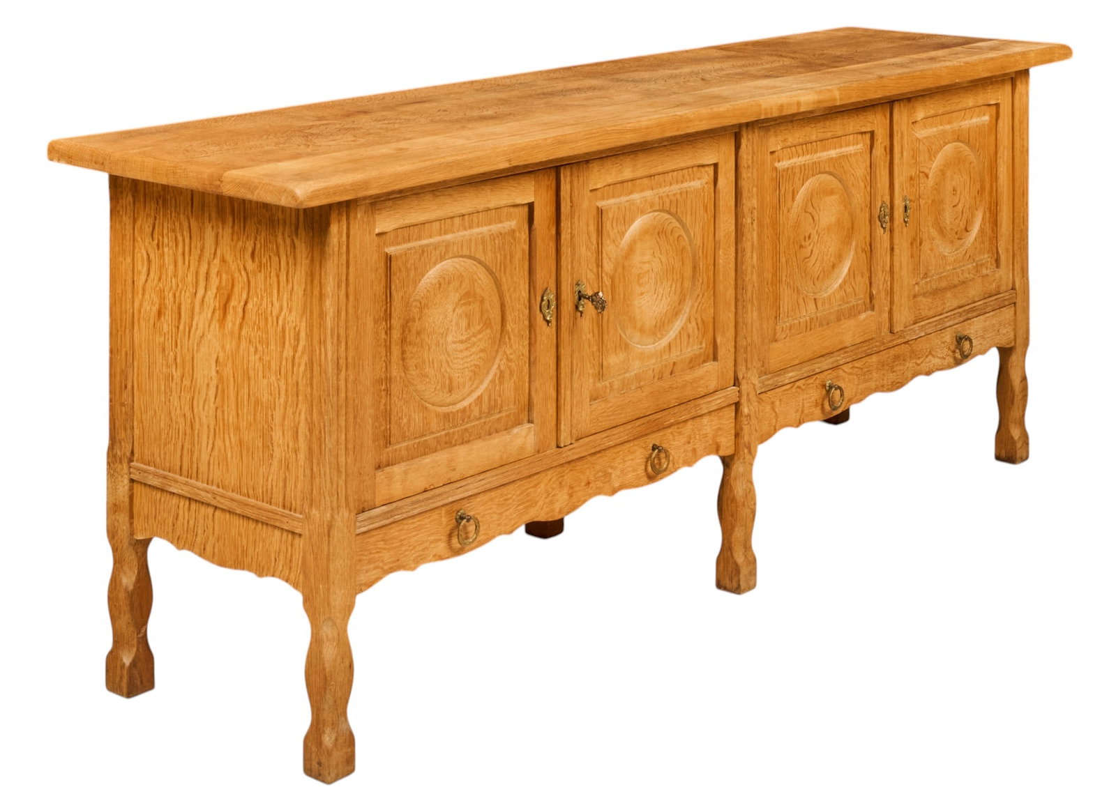 Danish Mid-Century Credenza: Danish mid-century credenza with oversize top, four carved cabinet doors opening to shelved interiors, and two lower drawers, supported on carved block legs height 31.5 in. x width 79 in. x depth 20