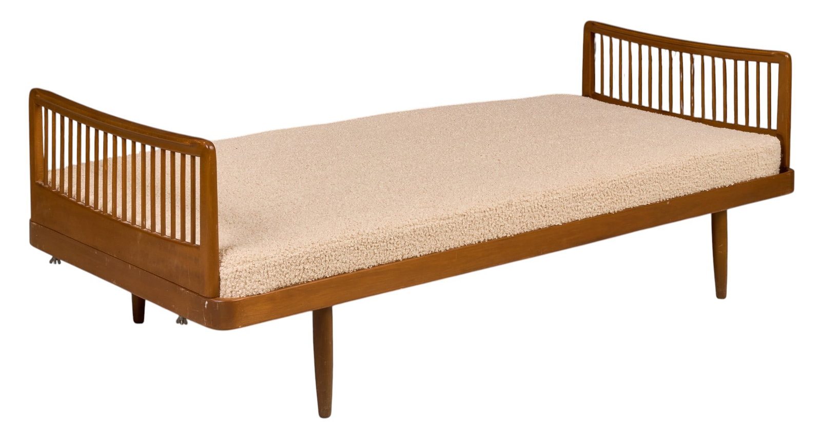 Danish Mid-Century Daybed: Mid-Century daybed, cream bouclé upholstery, walnut frame with curved spindle ends, raised on tapered legs height 25.5 in. x width 77 in. x depth 32 in.