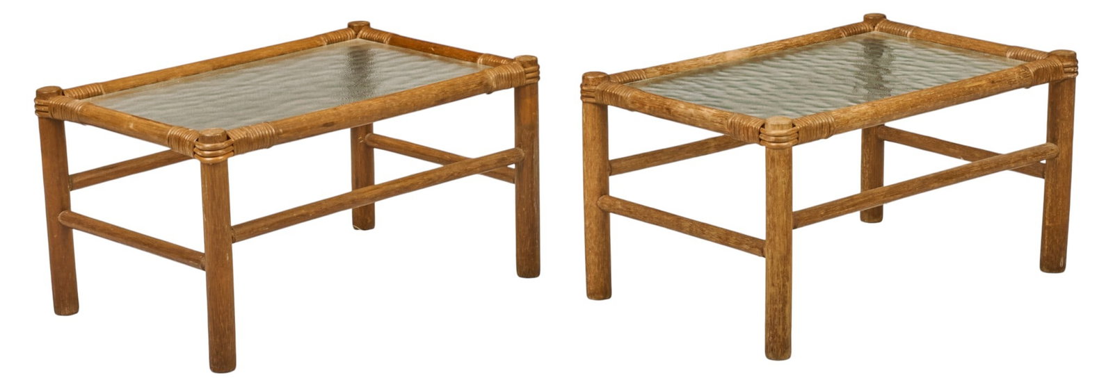 Pair of Danish Mid-Century Glass-Top Tables: Pair of Danish mid-century tables featuring rattan frames and glass tops, raised on stretchered pin legs height 14 in. x width 25.5 in. x depth 17 in. / each