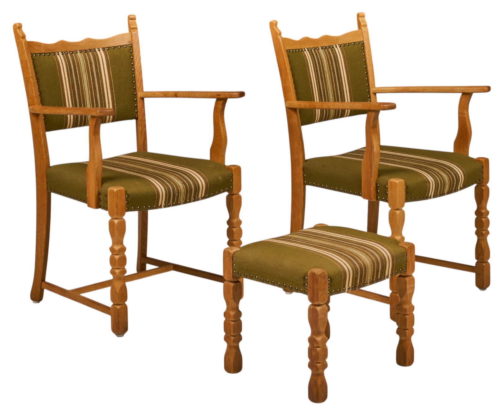 Pair of Henning Kjaernulf Mid-Century Armchairs and Ottoman: Henning Kjaernulf (Denmark) oak mid-century armchairs and matching ottoman, with striped cushions and turned legs height 37 in. x width 24.5 in. x depth 22 in. / each chair