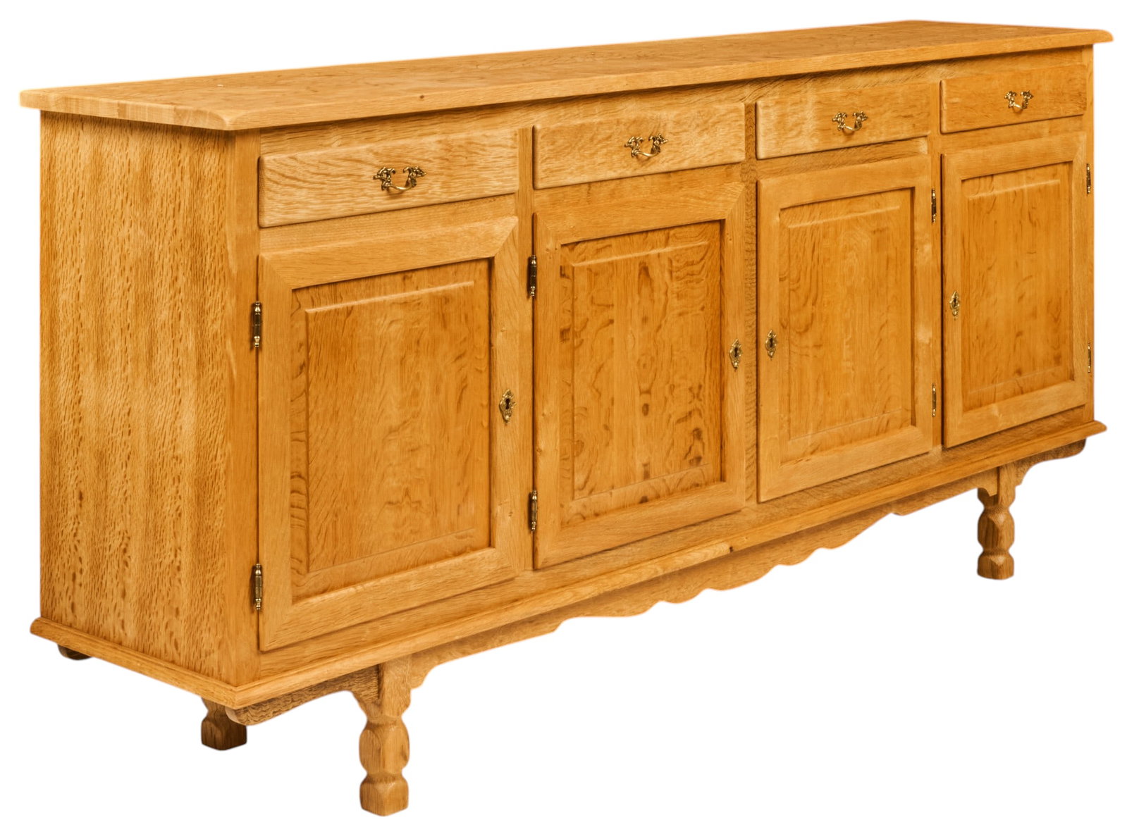 Boma Mobler, Danish Mid-Century Credenza: Danish mid-century credenza with four drawers with decorative brass pulls above four bottom cabinets opening to two shelved interiors, supported on block legs height 37 in. .x width 80 in. x depth
