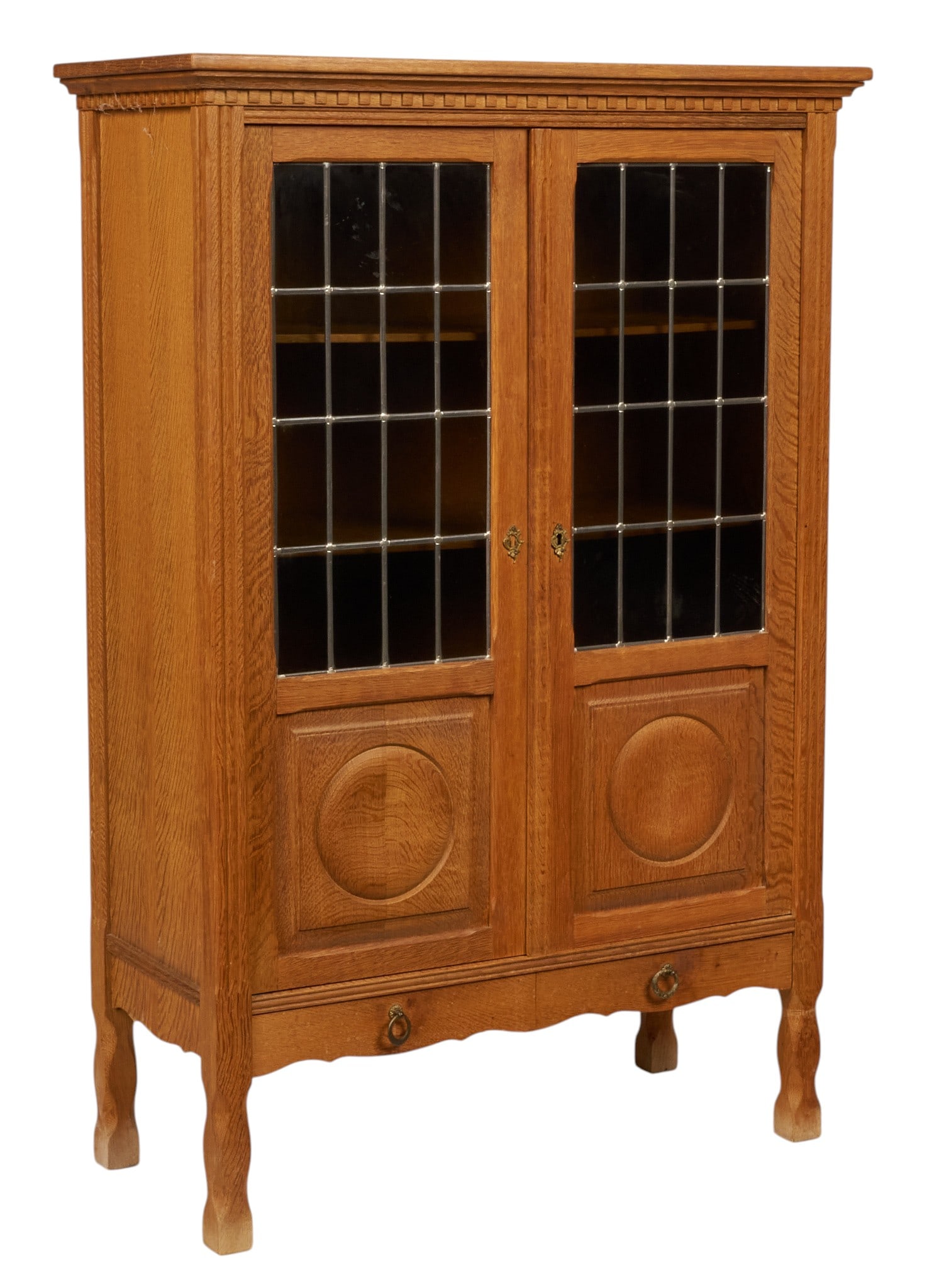 Danish Mid-Century Cabinet: Danish mid-century cabinet with leaded glass doors opening to shelved interior, above two bottom drawers with brass ring pulls, supported on shaped block legs height 59 in. x width 39.5 in. x depth 17
