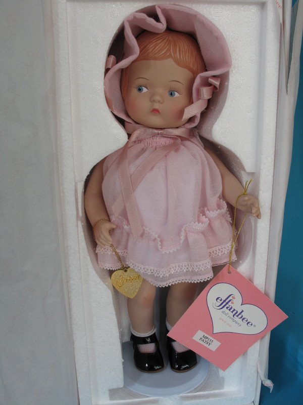 242. MIB porcelain Effanbee "Patsy" Ltd Edition: 242. MIB porcelain 36cm Effanbee "Patsy" limited edition of 1928 composition mold with COA, gold metal heart, original pink organdy outfit.